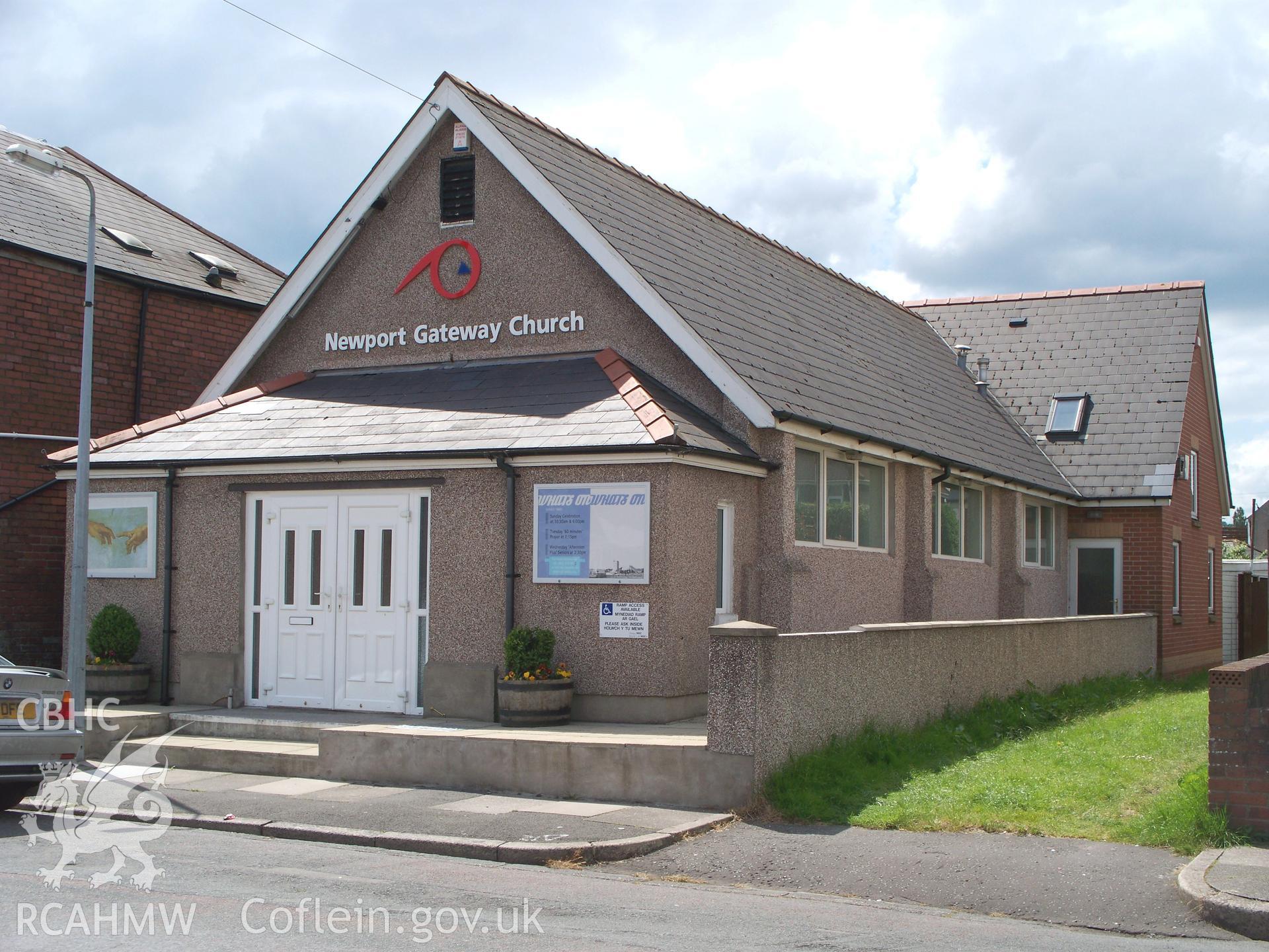Main east gable-end fa?ade with 'Newport Gateway Church' sign.
