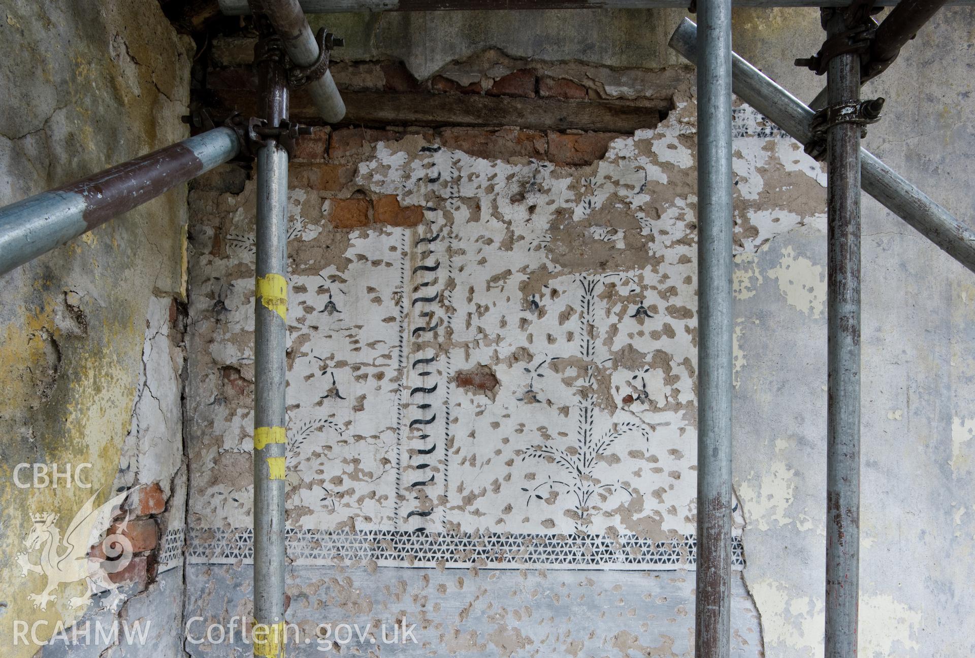 Detail of decoration on north wall of central bay, first floor.