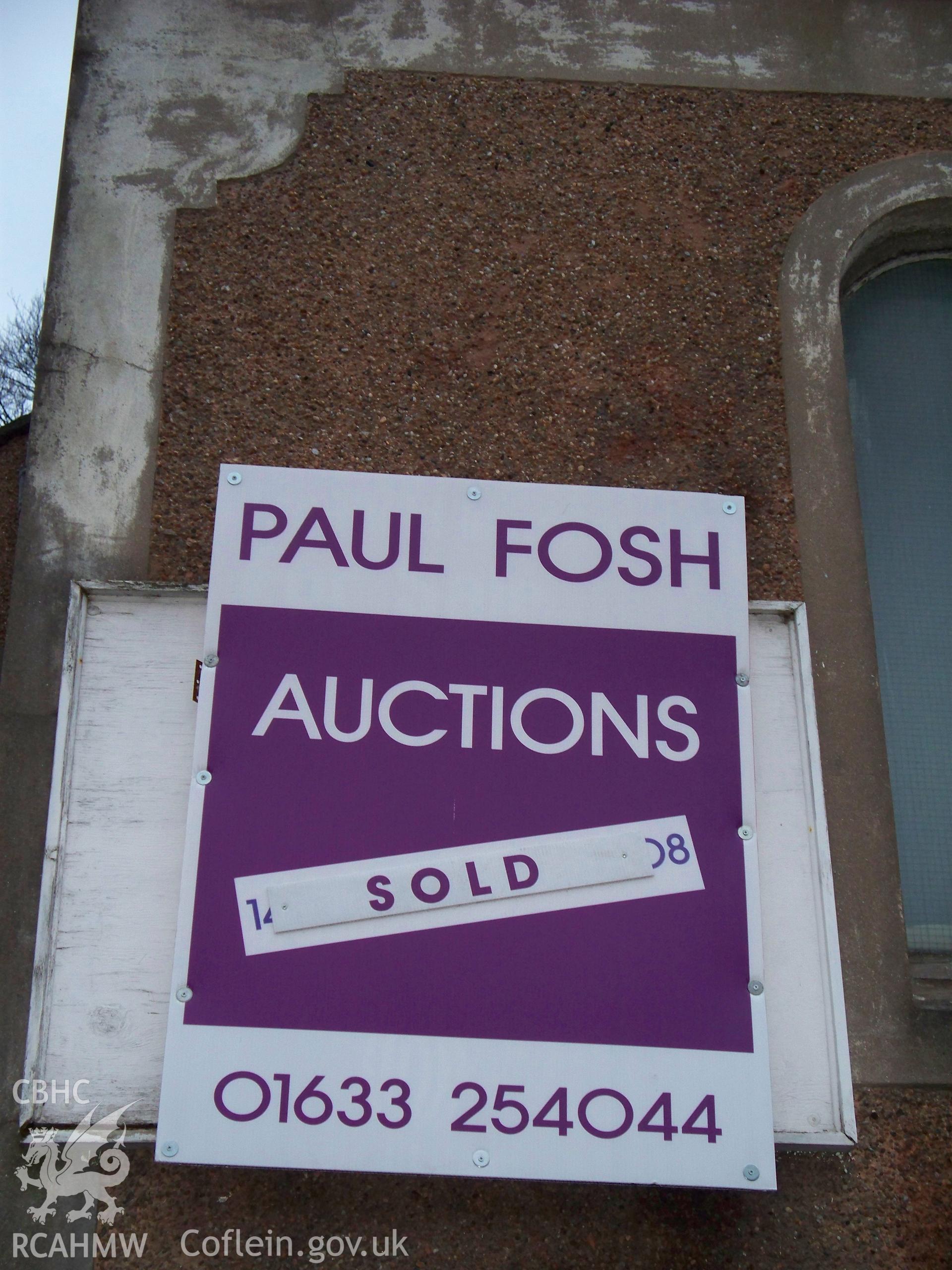 `Sold? sign on SW front of chapel.