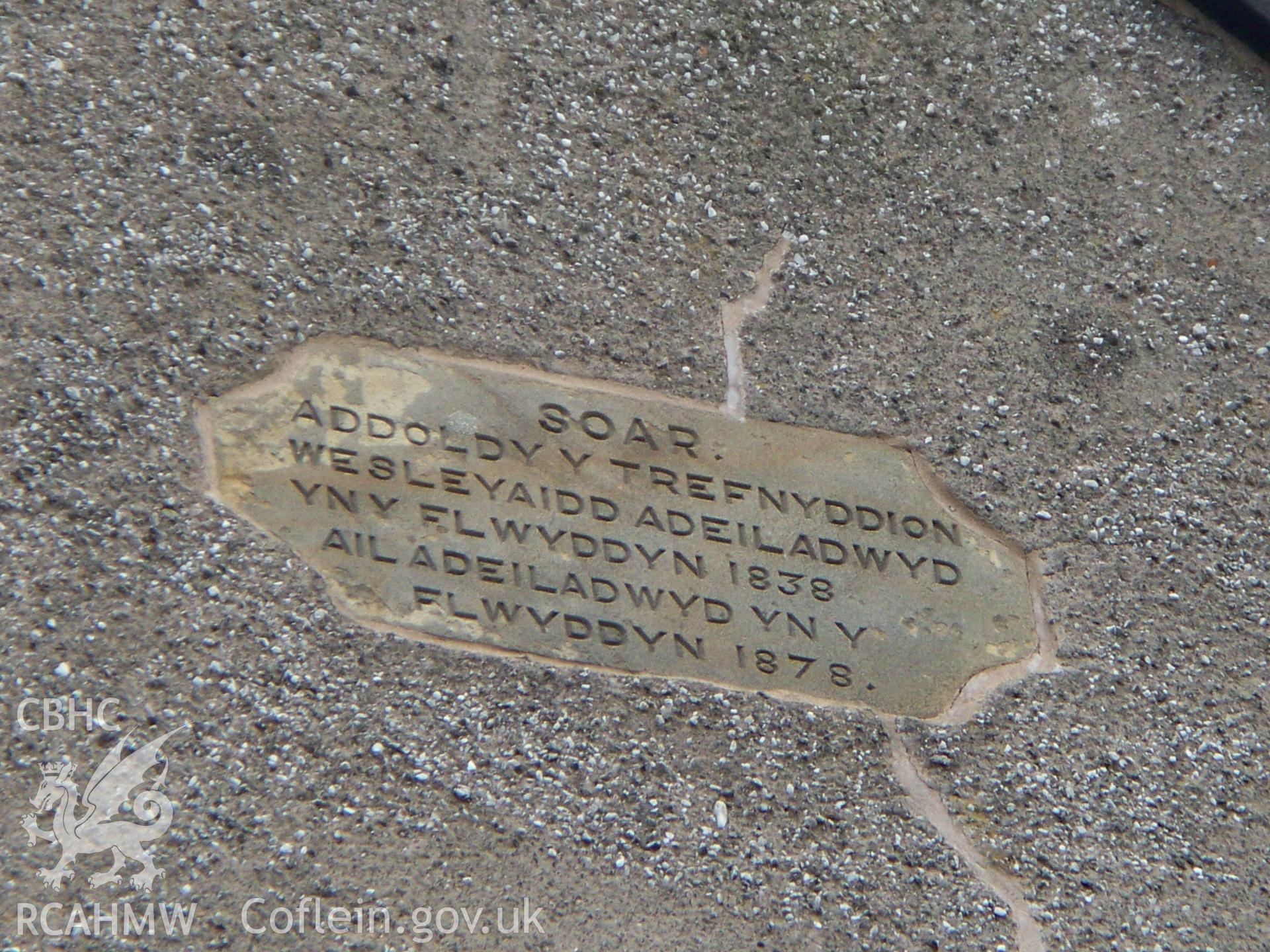 Plaque on upper south front recording the building in 1838 and the rebuilding in 1878.