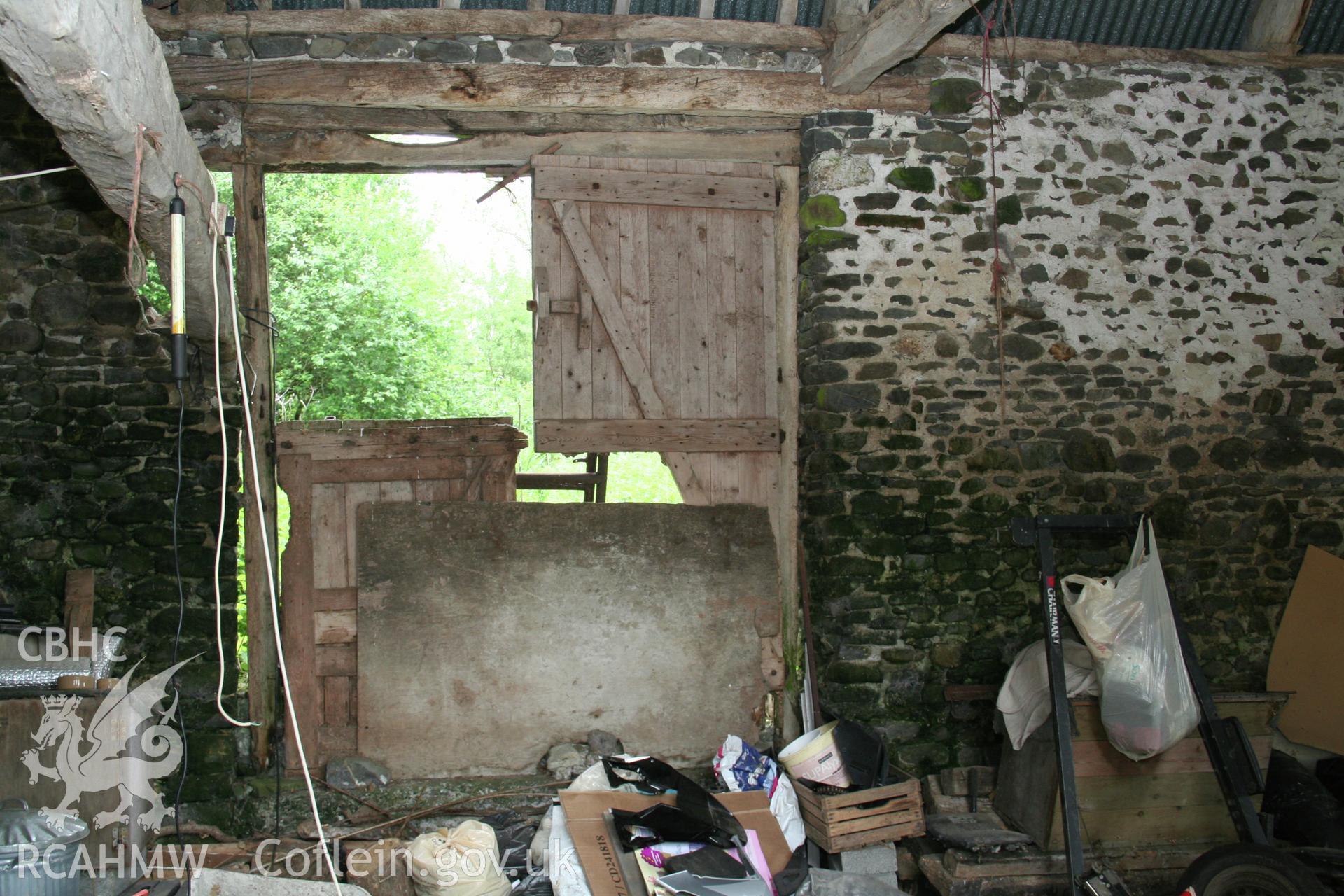 Interior detail of threshing doorway to north elevation.