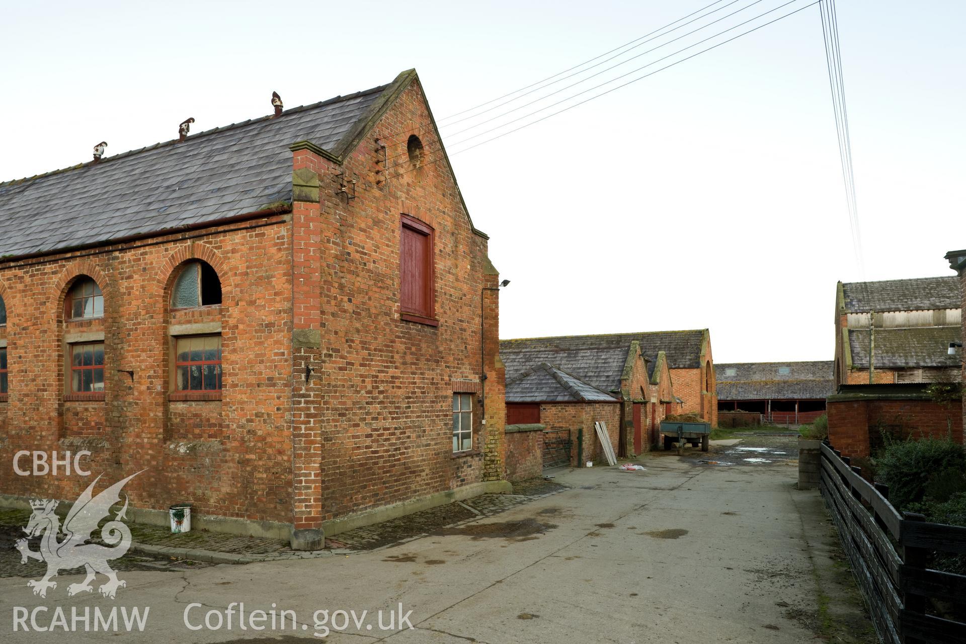 Oblique view of north side of cattle sheds.