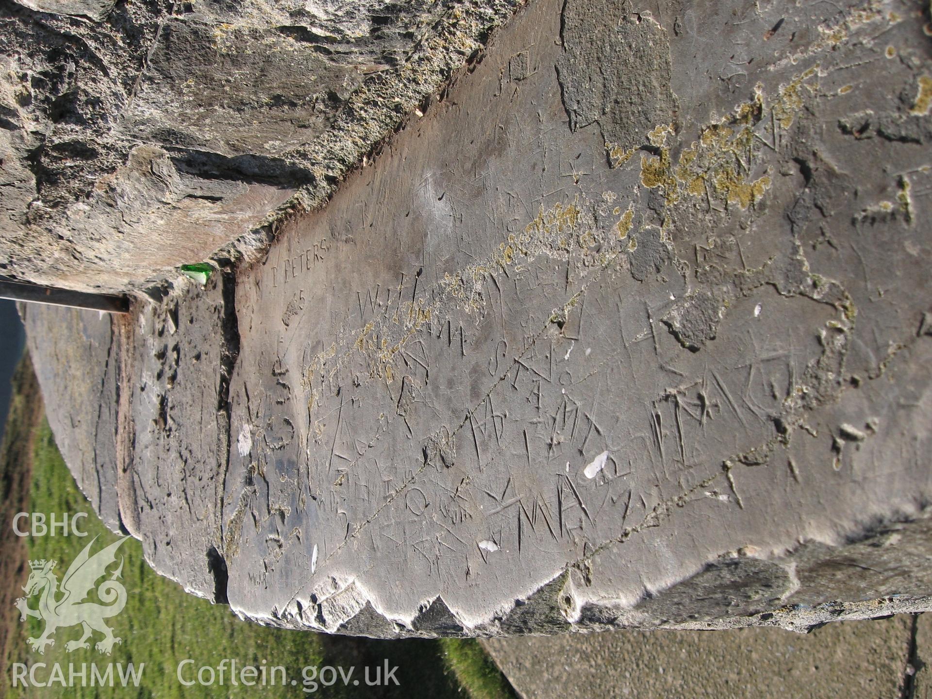 The Wellington Monument. Historic graffiti inscribed on north-east part of lower pediment.