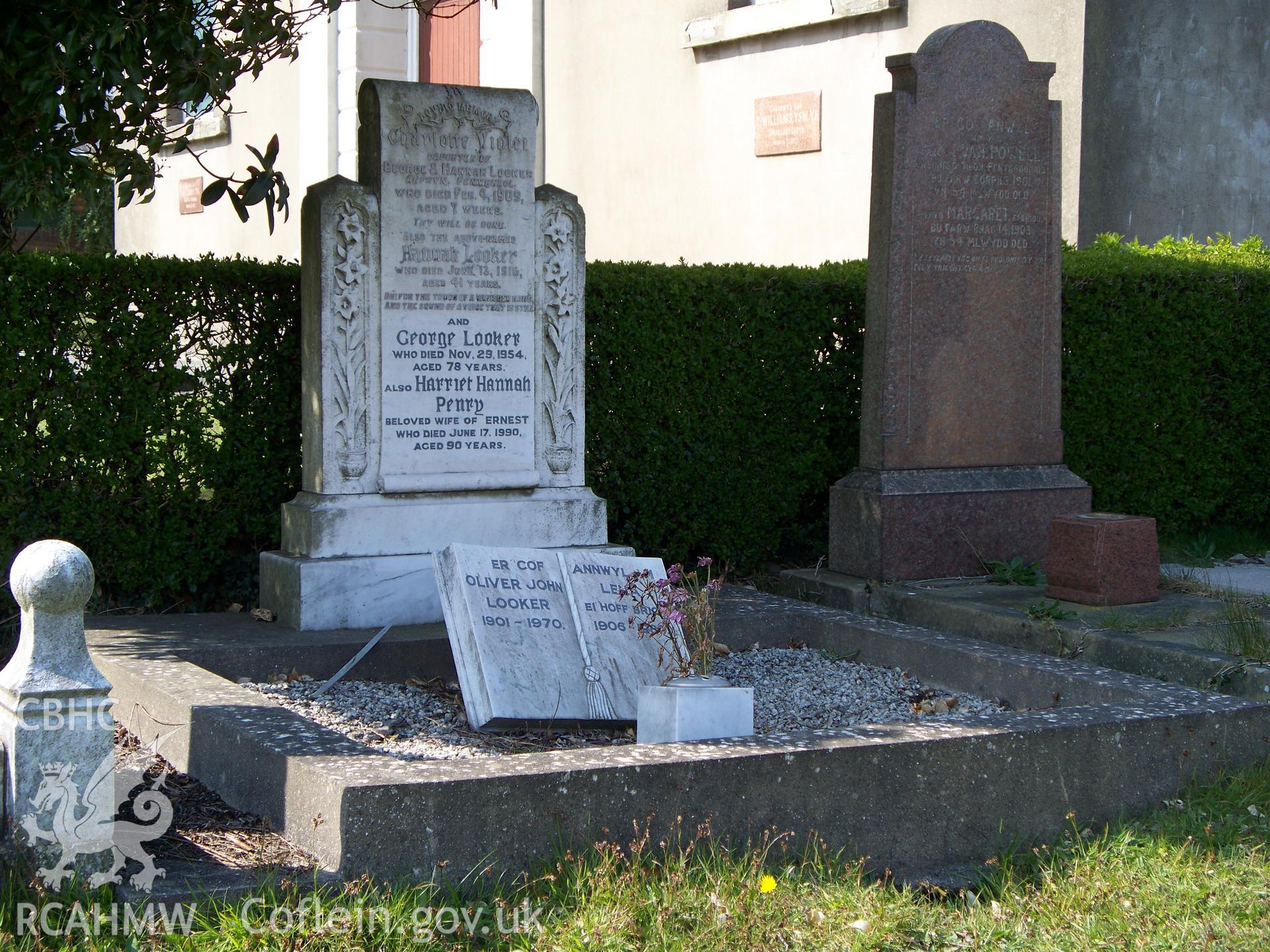 Memorials to Charlotte Locker 1909 & Evan Powell 1901.