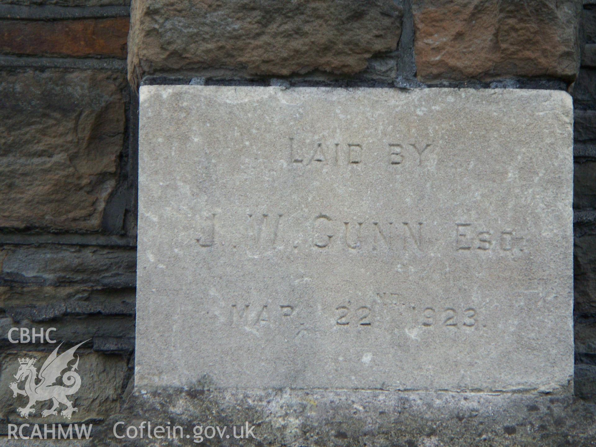 Foundation stone by J. W. Gunn on the NW corner of the N. front.