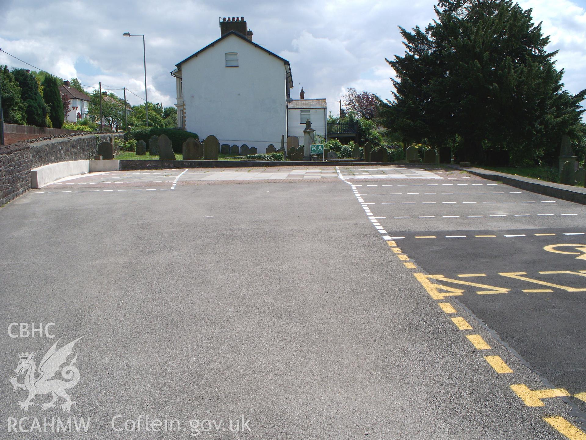 Modern car-park over the south-east part of the burial ground.
