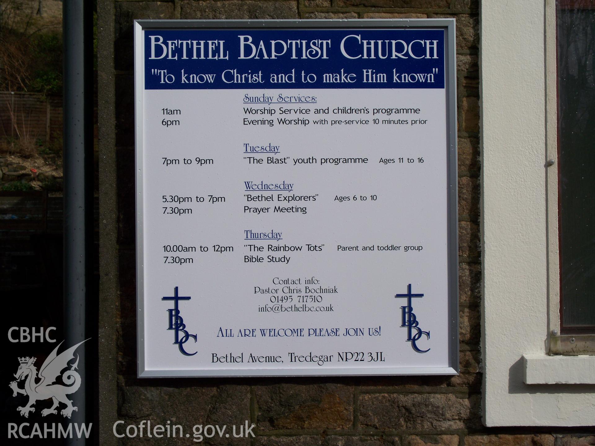 Order of service board on the west front.