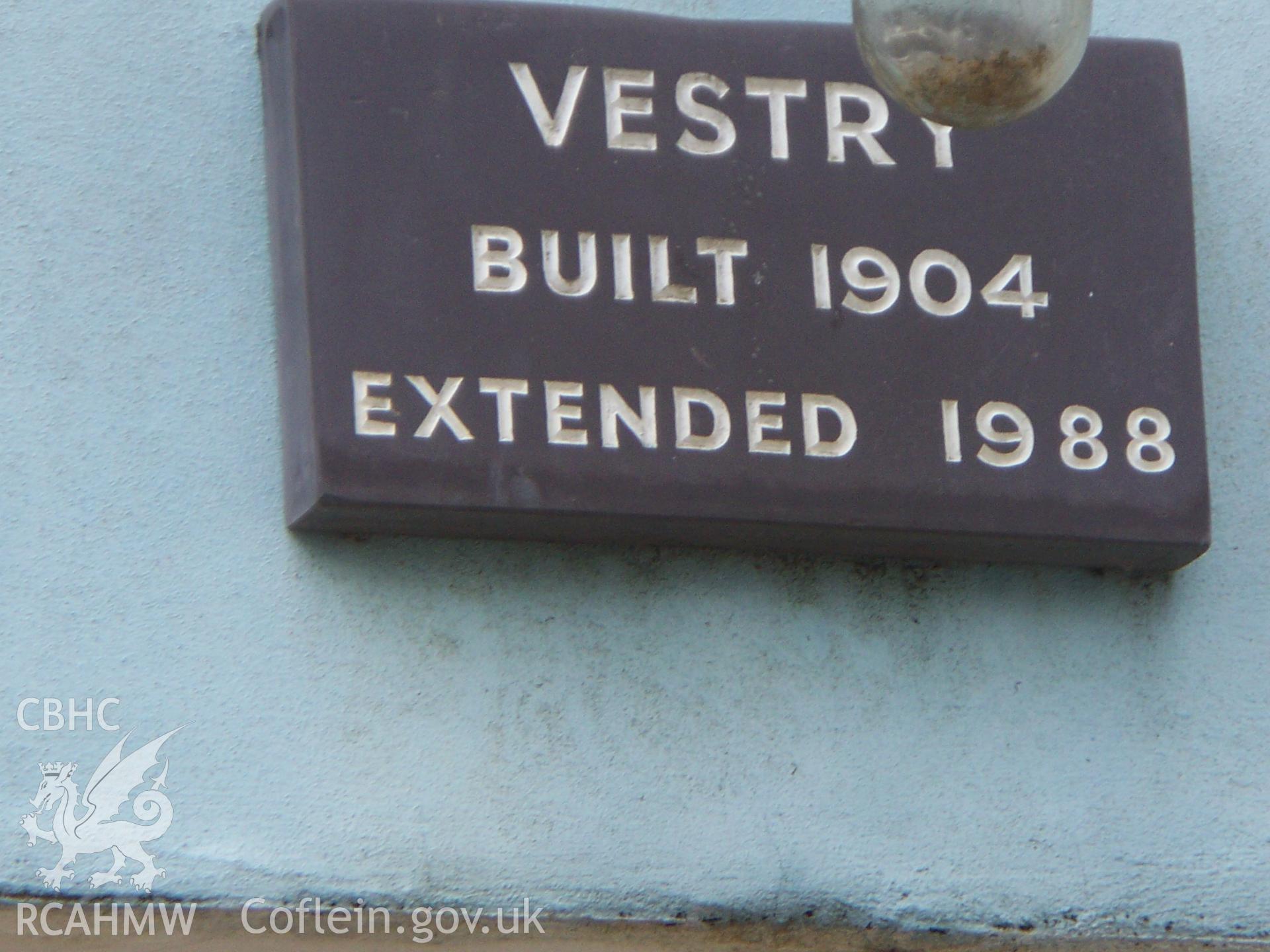 Plaque on SE Vestry front stating 'VESTRY BUILT 1904 Extended 1988'.