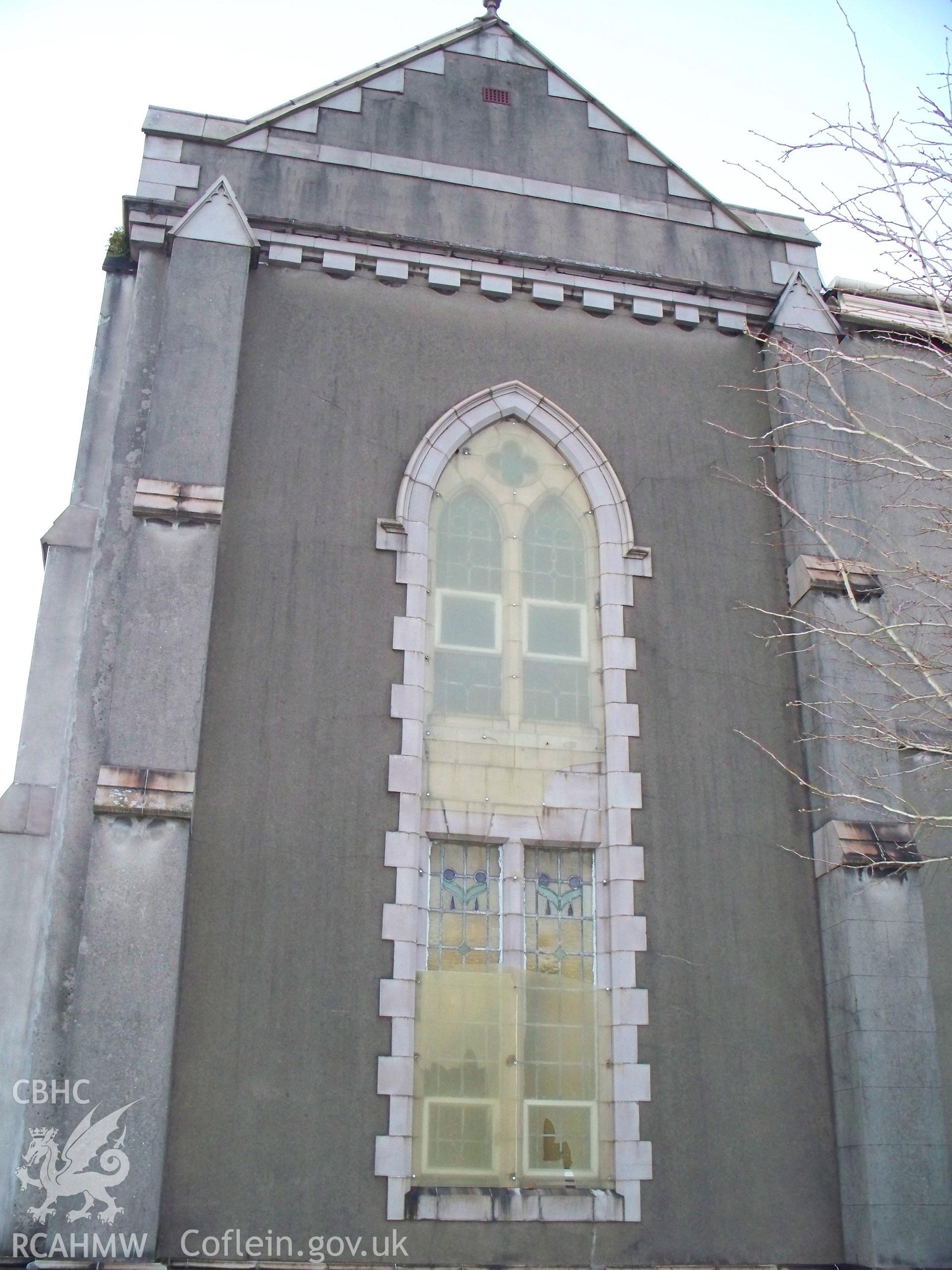 South staircase window on SW end of SE side.