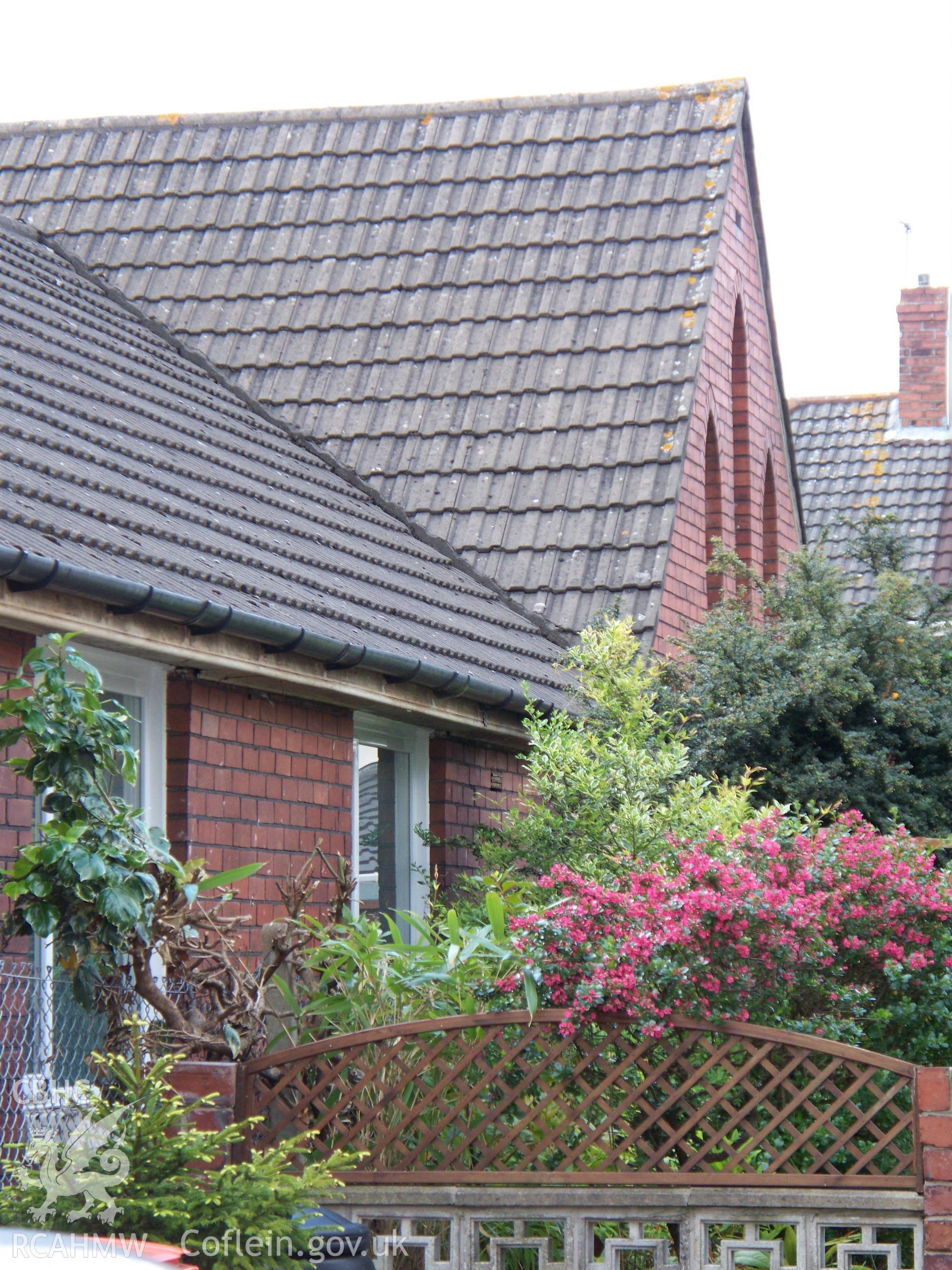 Main early 20th century NE gothic gable of the original chapel.