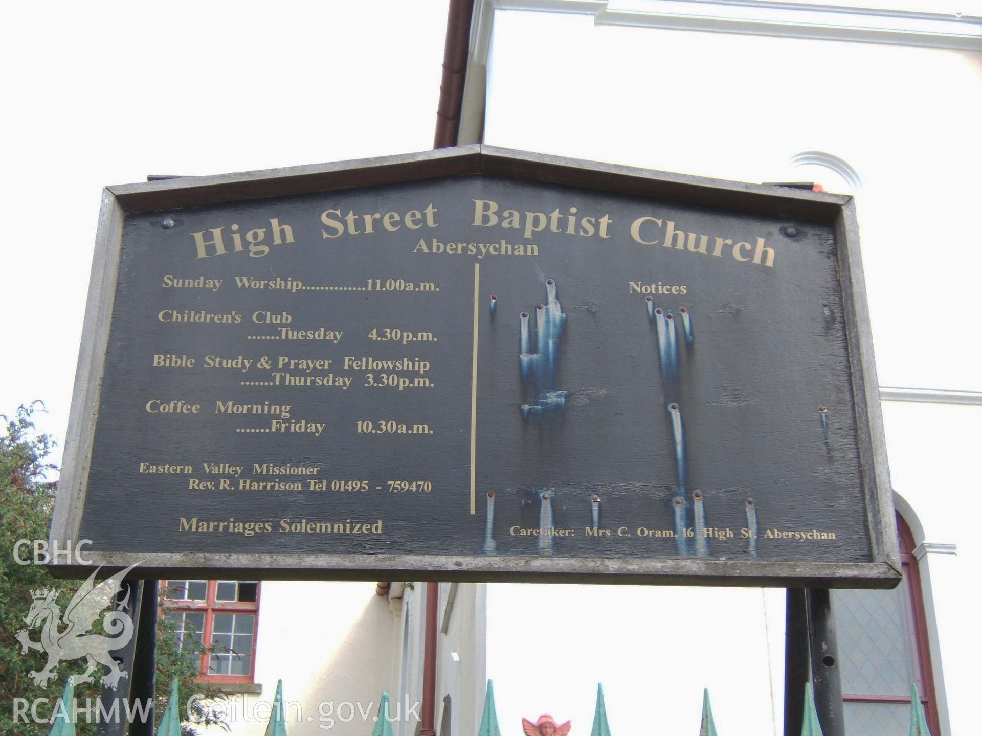 Order of Services Board on south front.