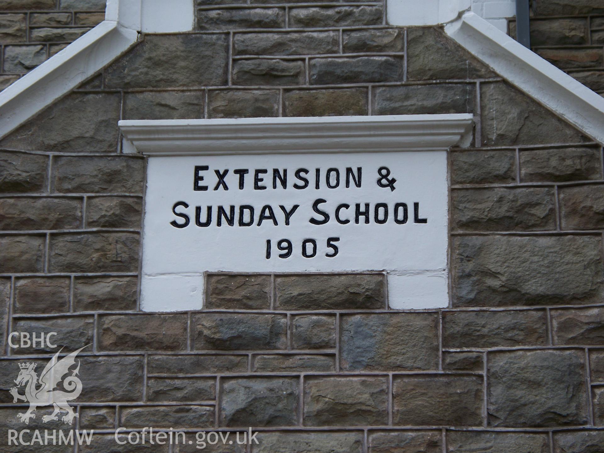 'Extension & Sunday School 1905' plaque on NE porch.