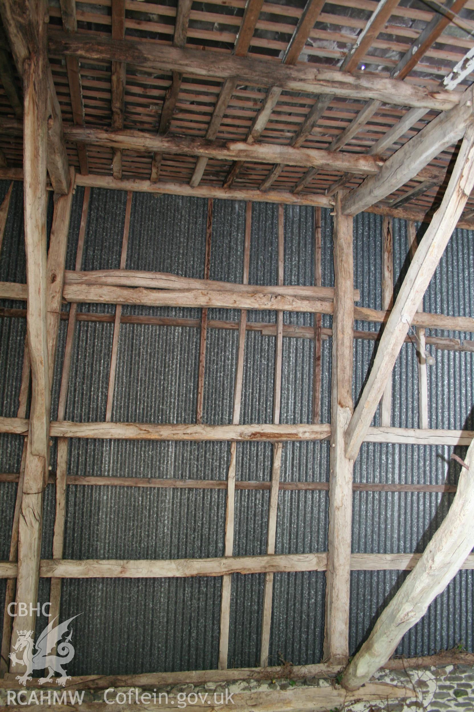 Interior view of purlins & rafters between roof trusses.