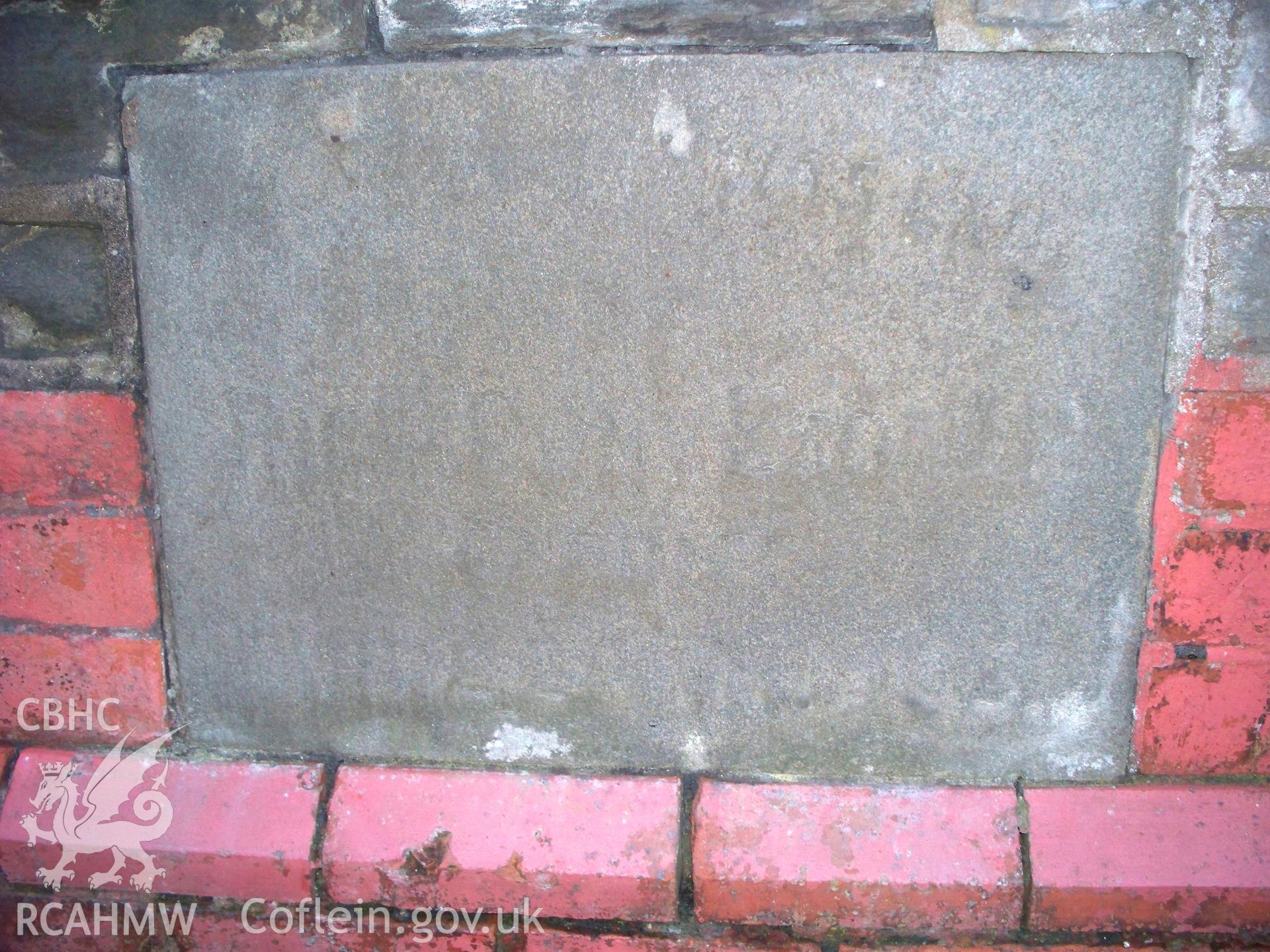 Dated foundation stone on NW front.