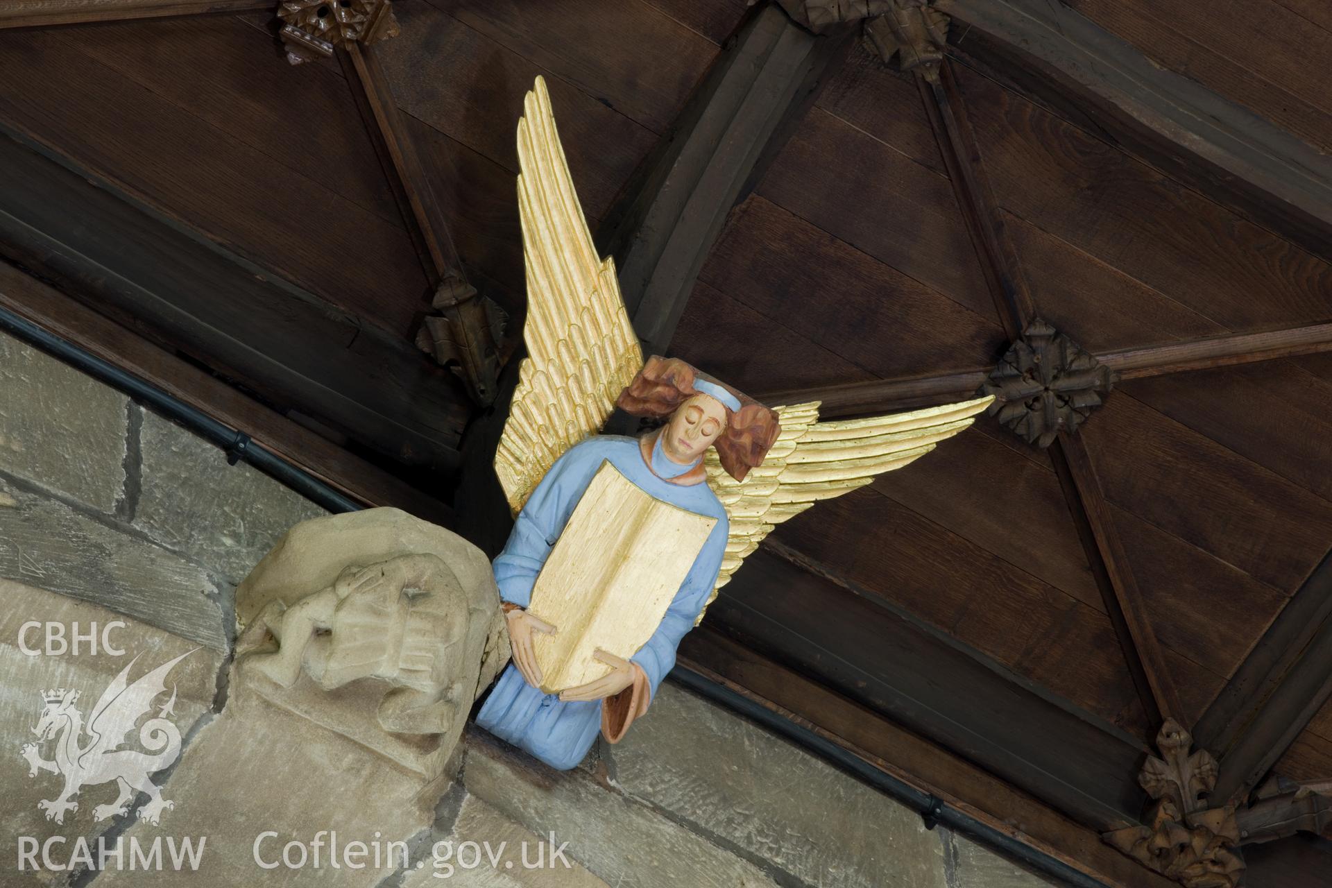 Carved angel ceiling decoration.