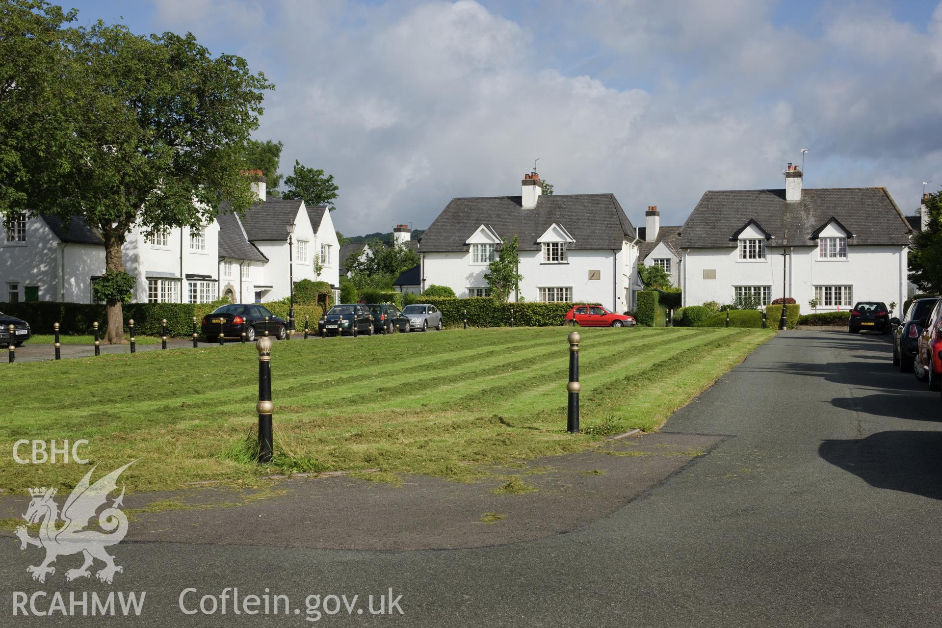 Y Groes, view across green from south east (sundial and date inscriptions visible on walls).