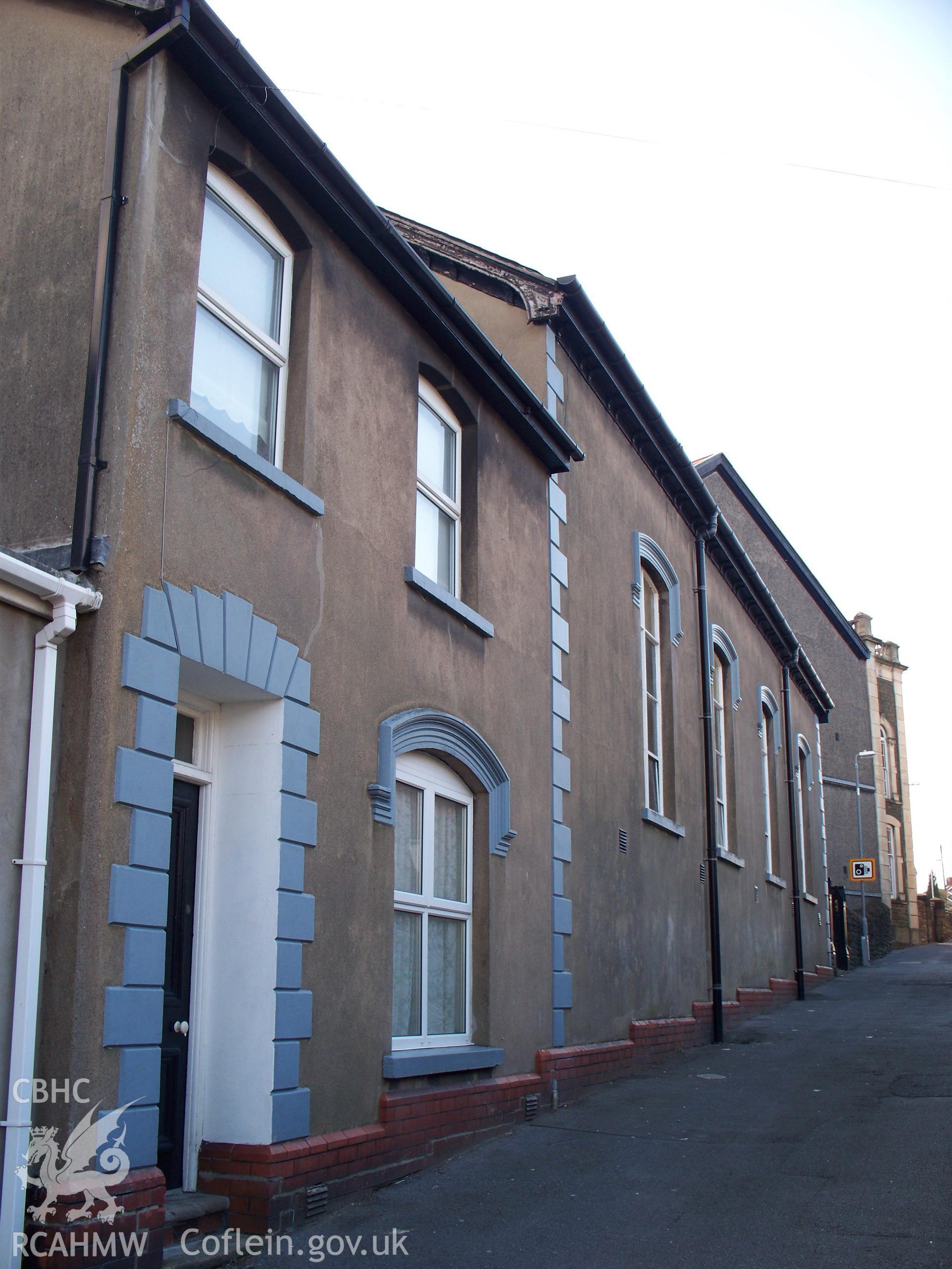 NE front of chapel house with school & chapel beyond.