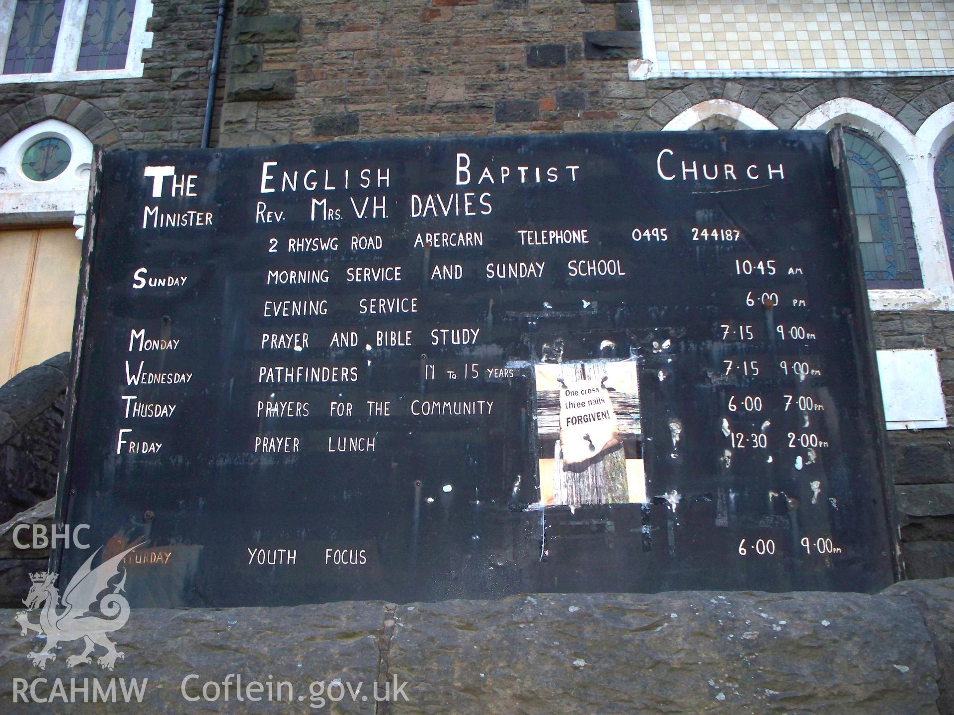Chapel noticeboard on SW front.