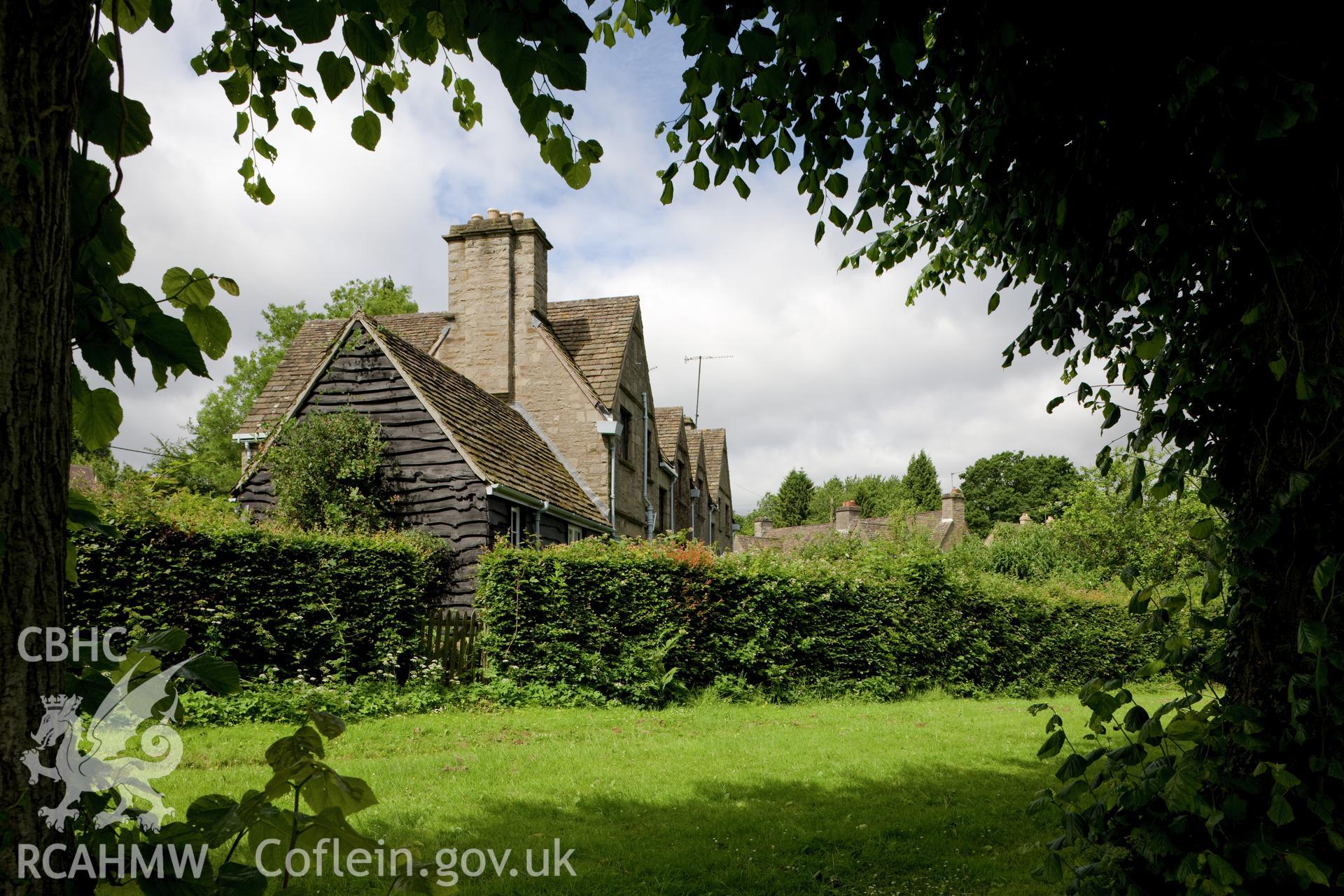 Cottages to south of green viewed from the east.