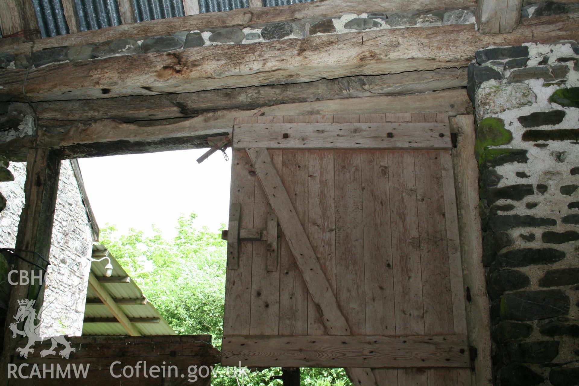 Interior detail of threshing doorway to north elevation.