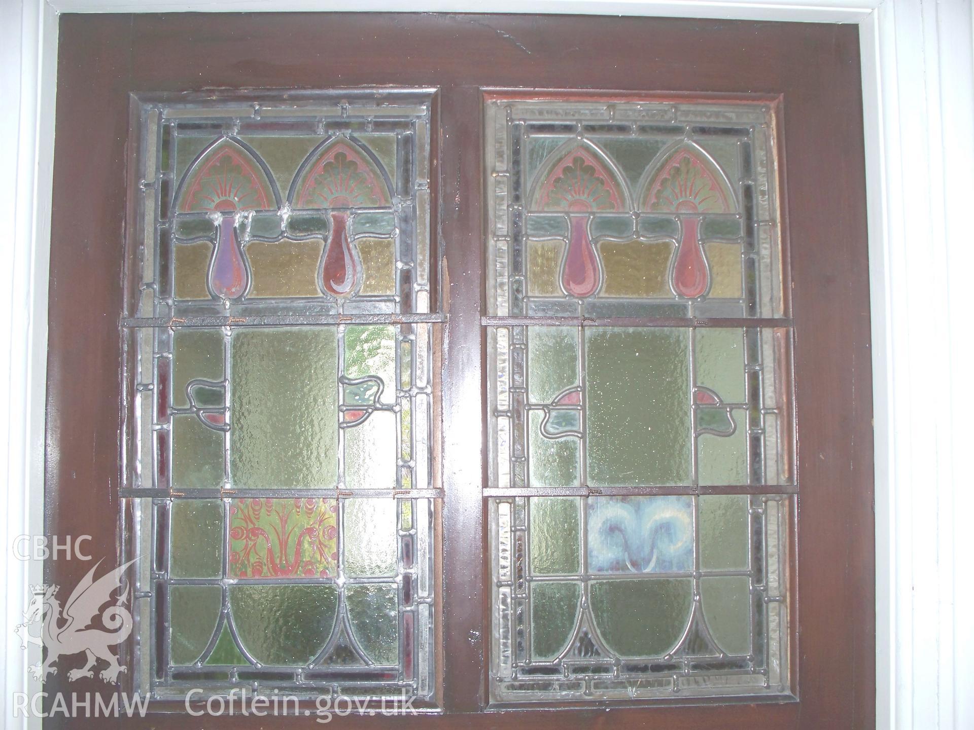 Art Nouveau glass in NW entrance doors.