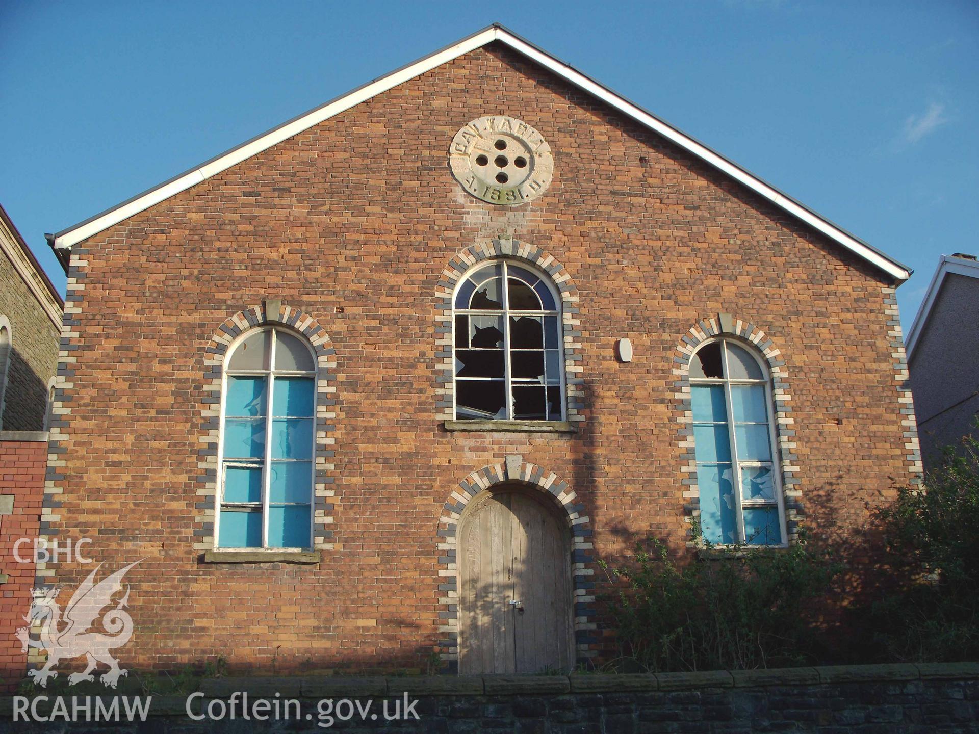 1881 original brick-built chapel (later Sunday school) with plaque in gable.