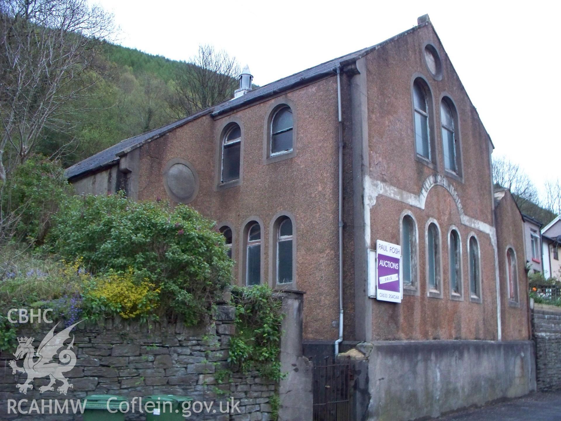 NE entrance and SW gable front from the NW.