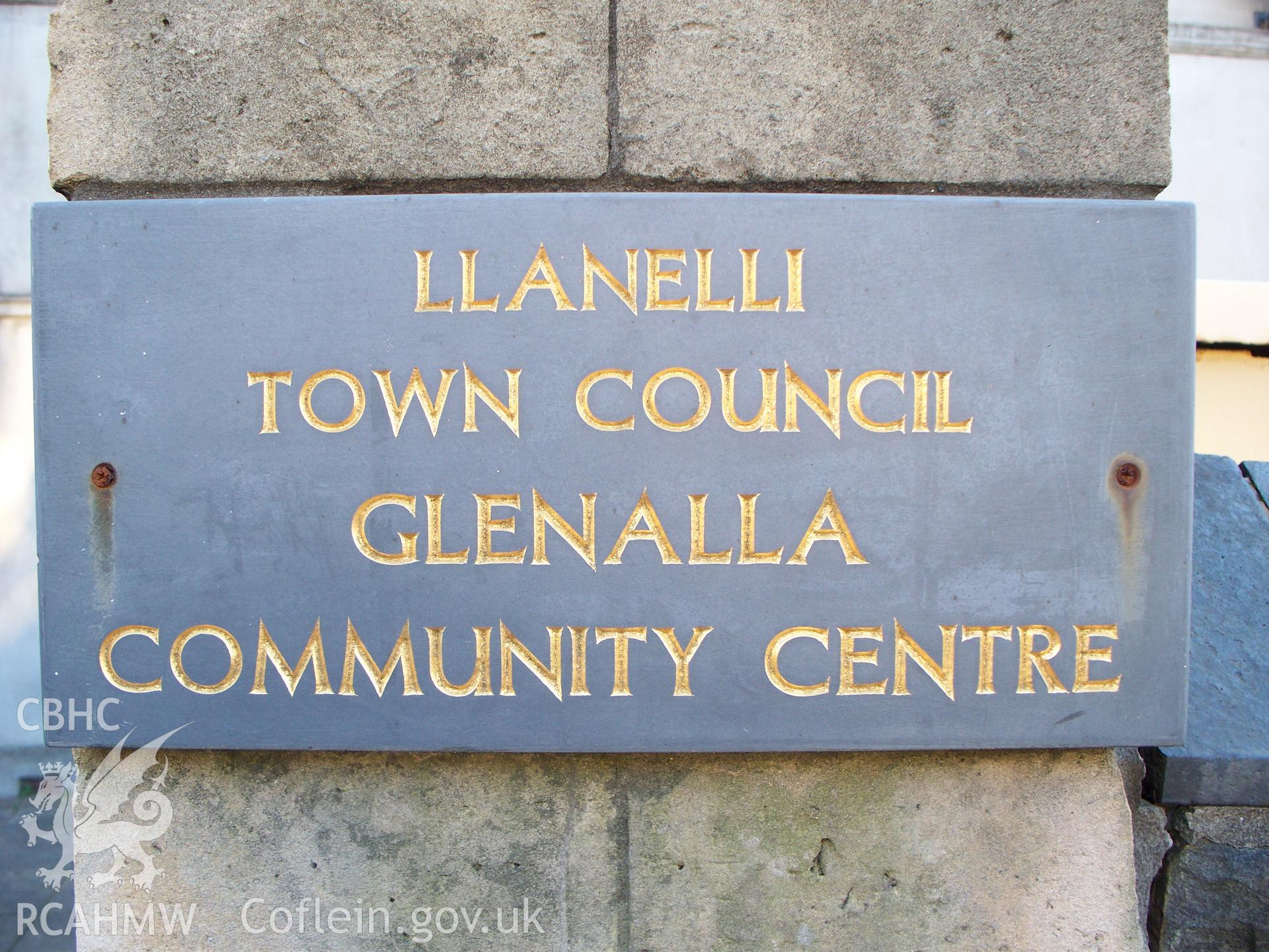 Community Centre notice on gate piers.