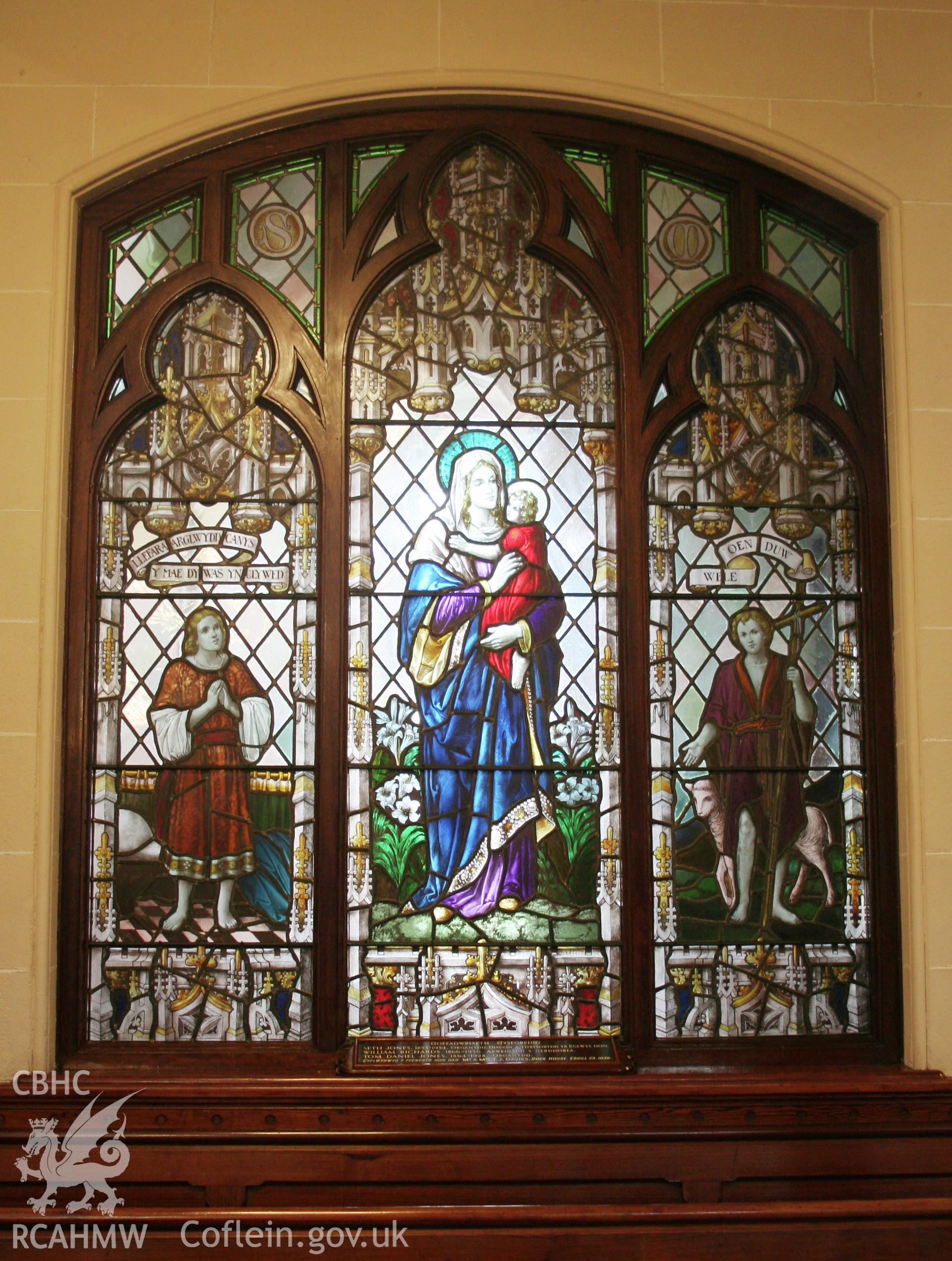 Capel Als, stained glass window at the north end of the main interior.