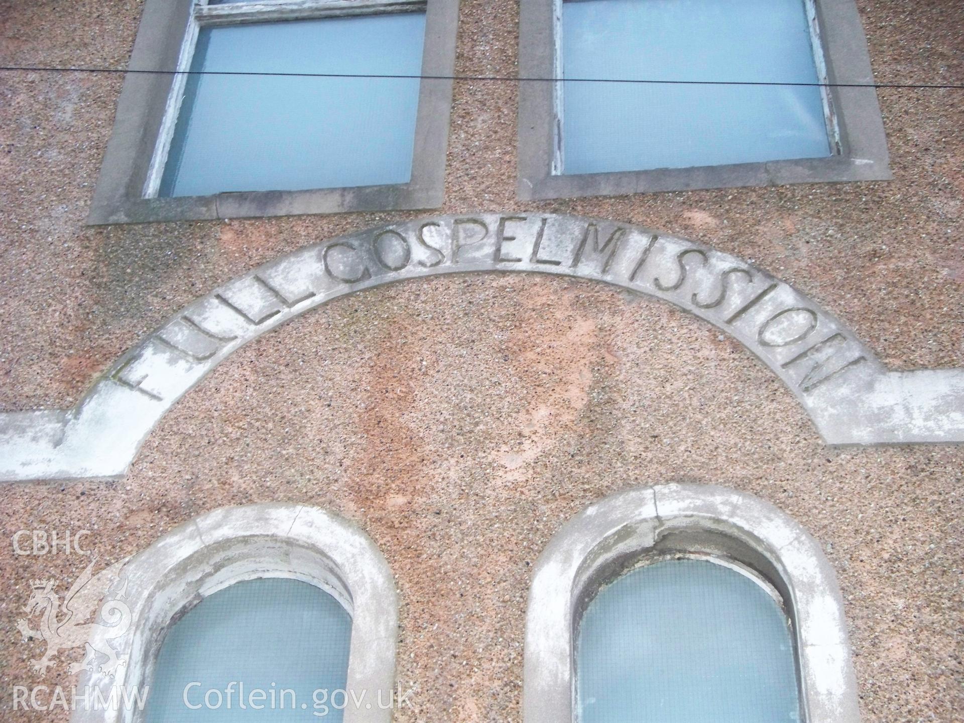 `Full Gospel Mission? inscription on main SW front.