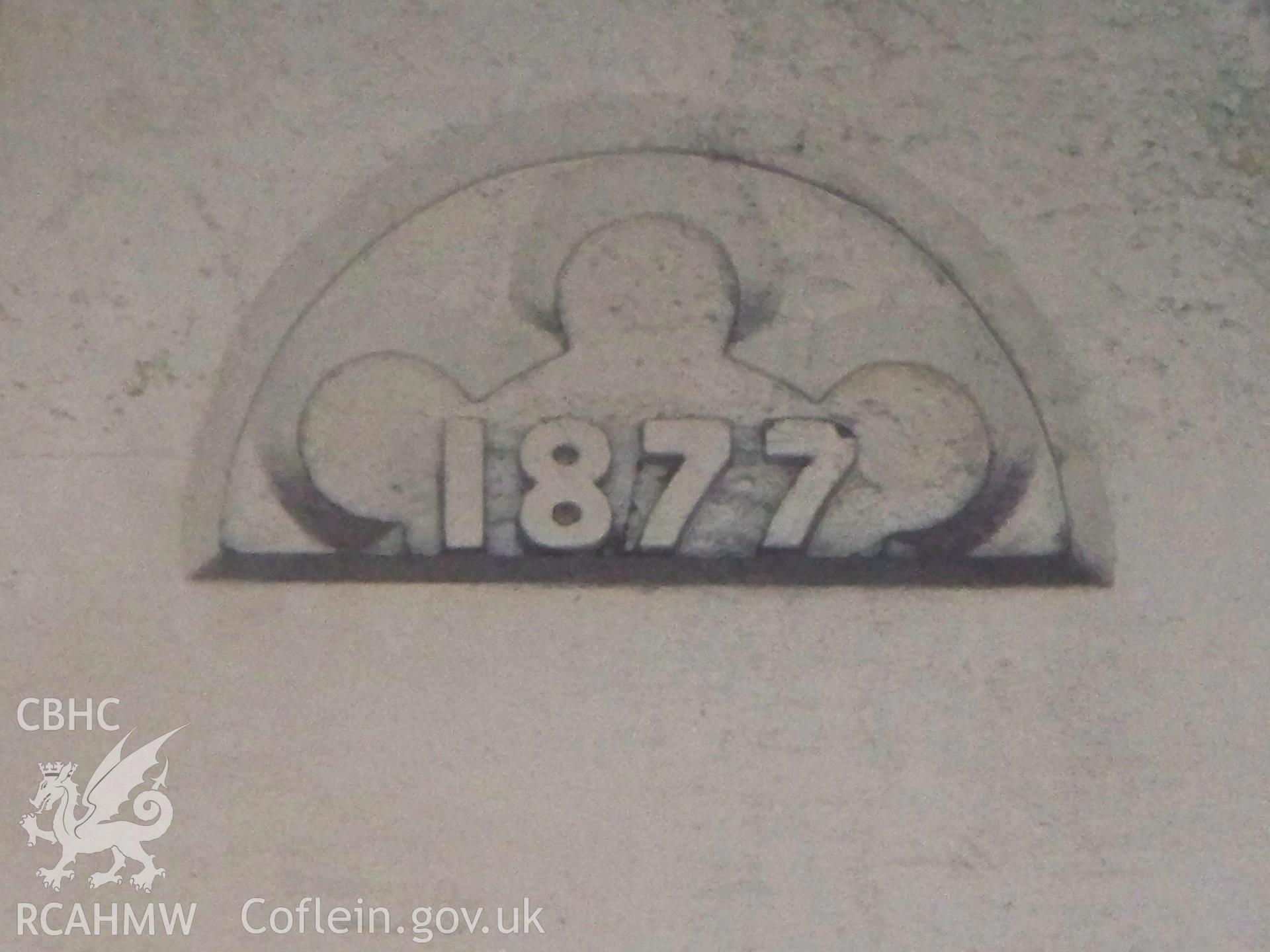 Date plaque of 1877 on the main SE front.