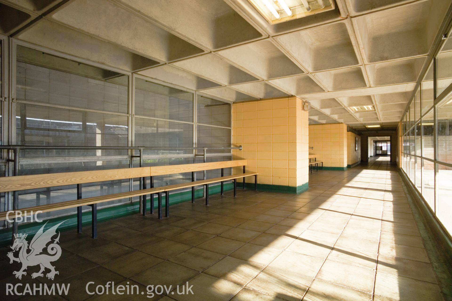 Light shaft between levels, behind east/west corridors