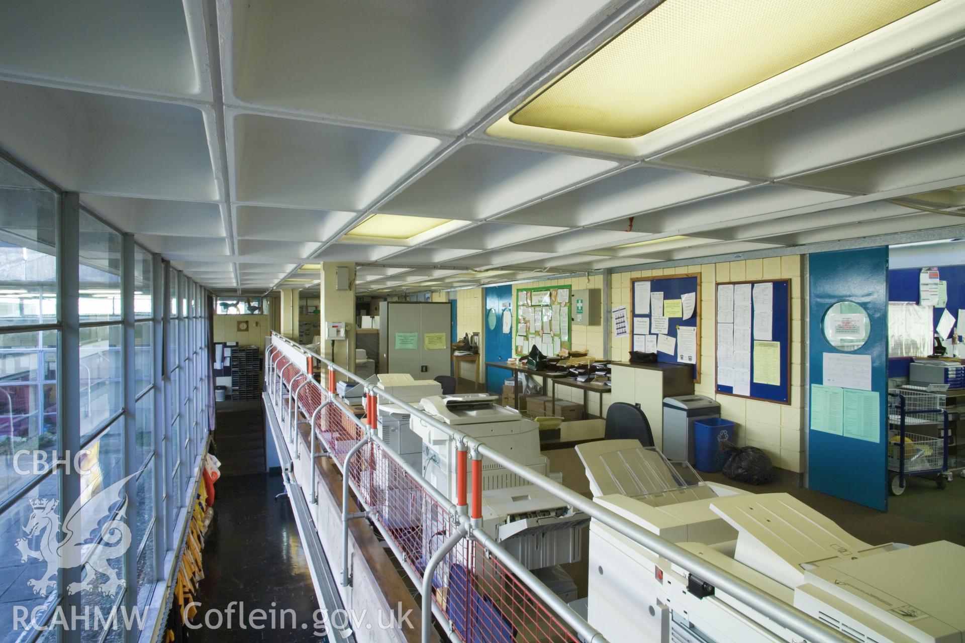 Circulation/photocopier corridor, lower level below