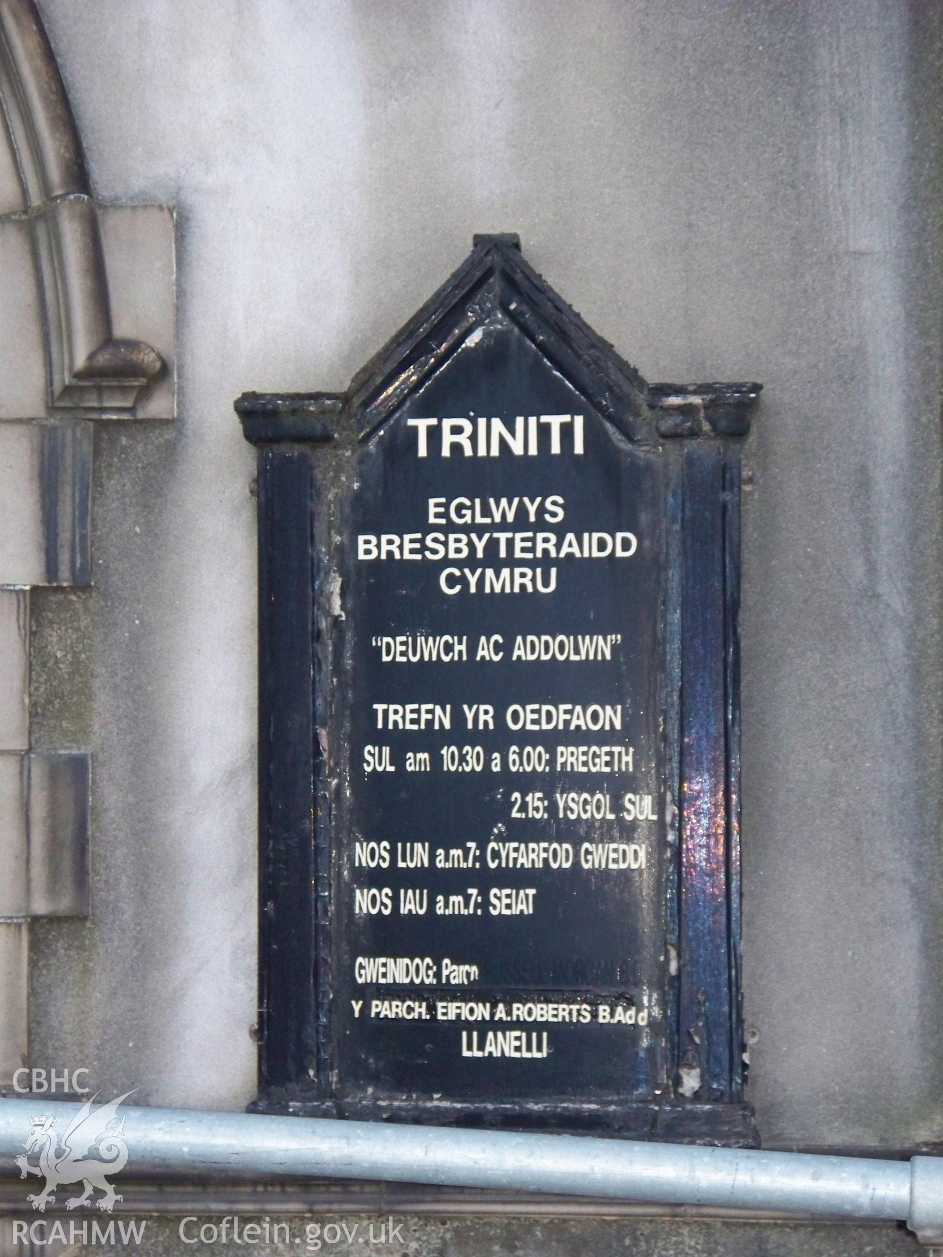 Order of service board on SW front.