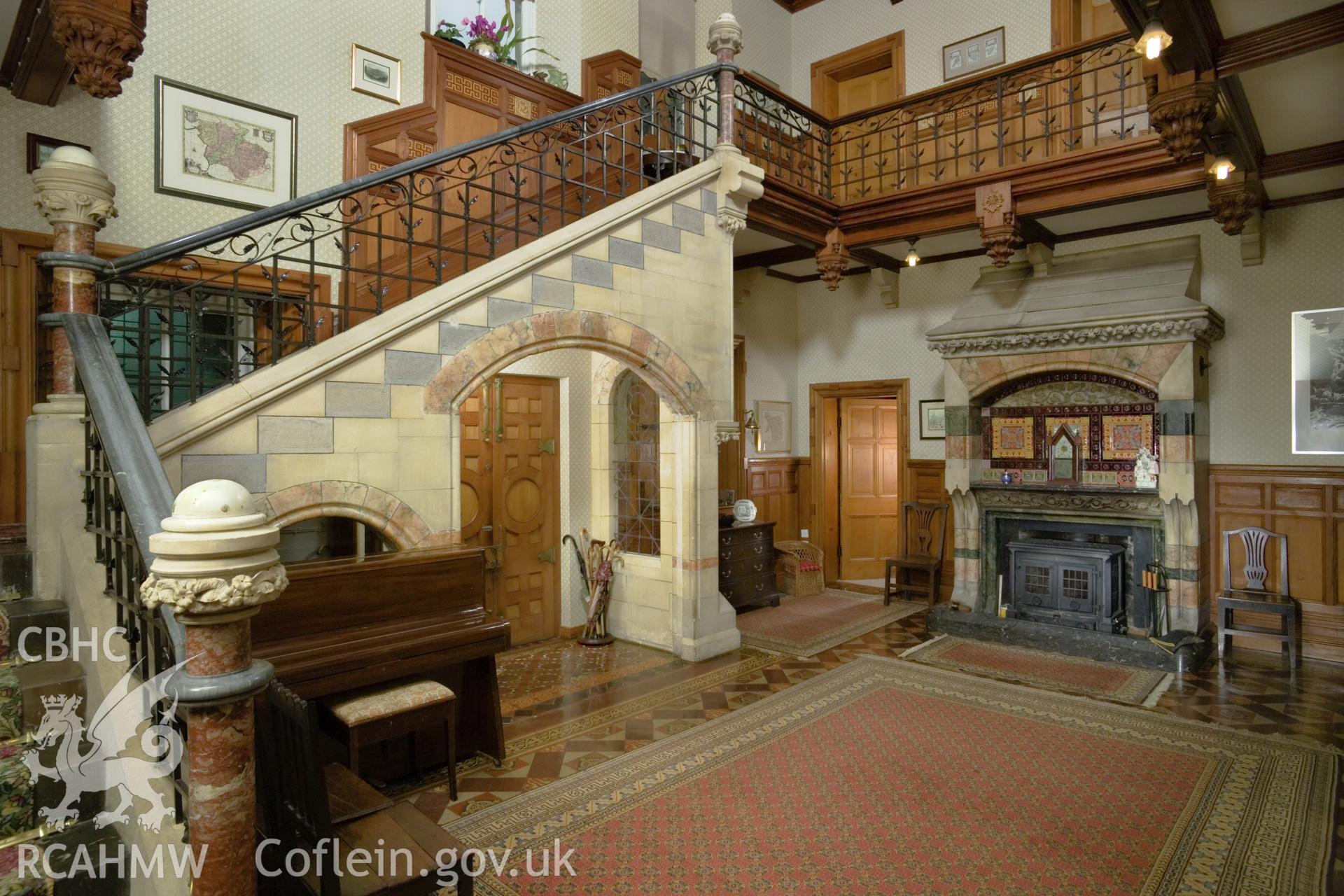 Interior, entrance hall looking towards fireplace.
