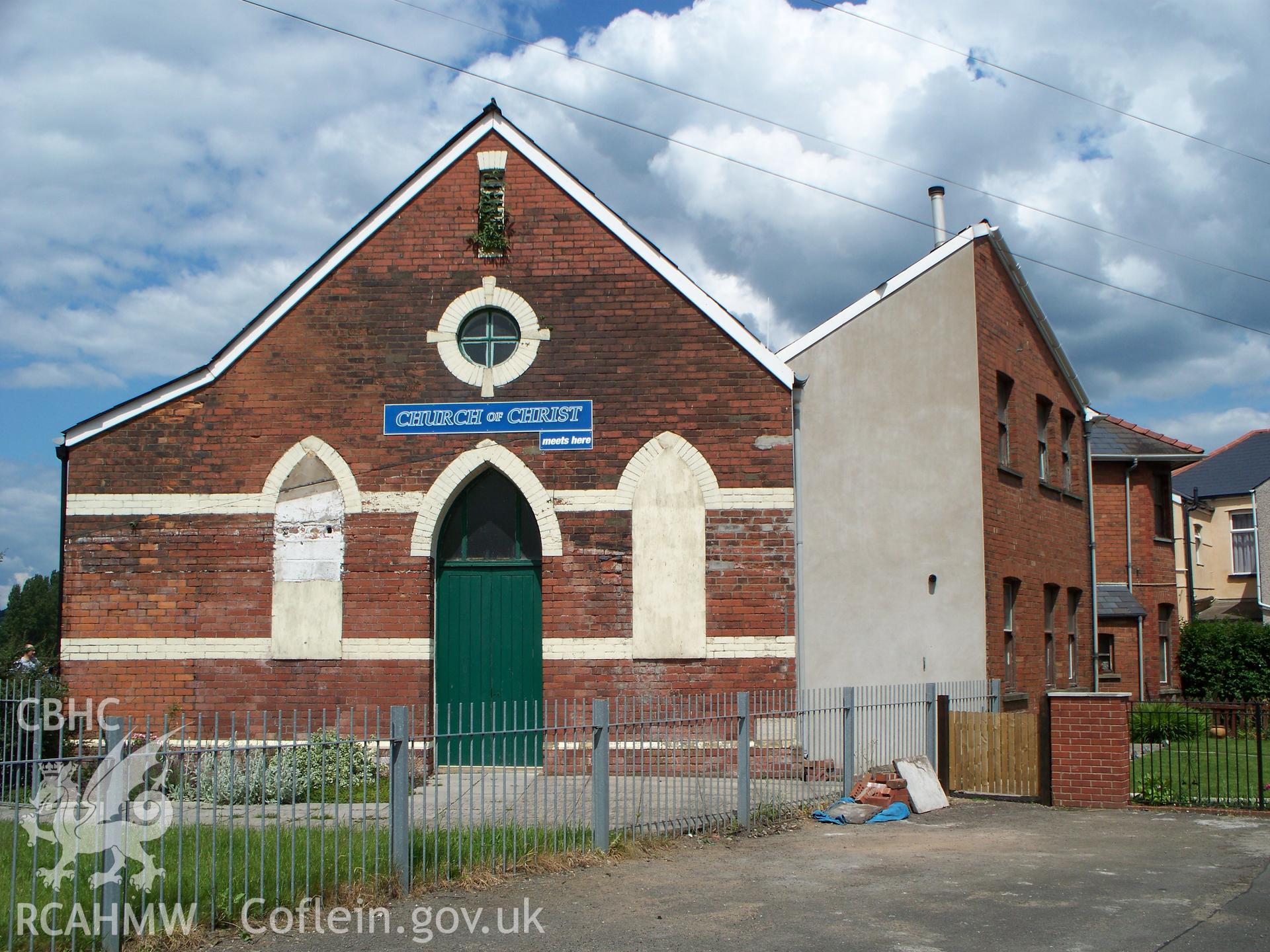 Main south-east gable-end front, 'Church of Christ' sign.