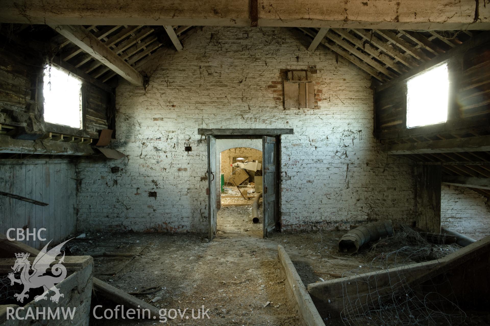 Interior, first floor of west central wing of cow shed.