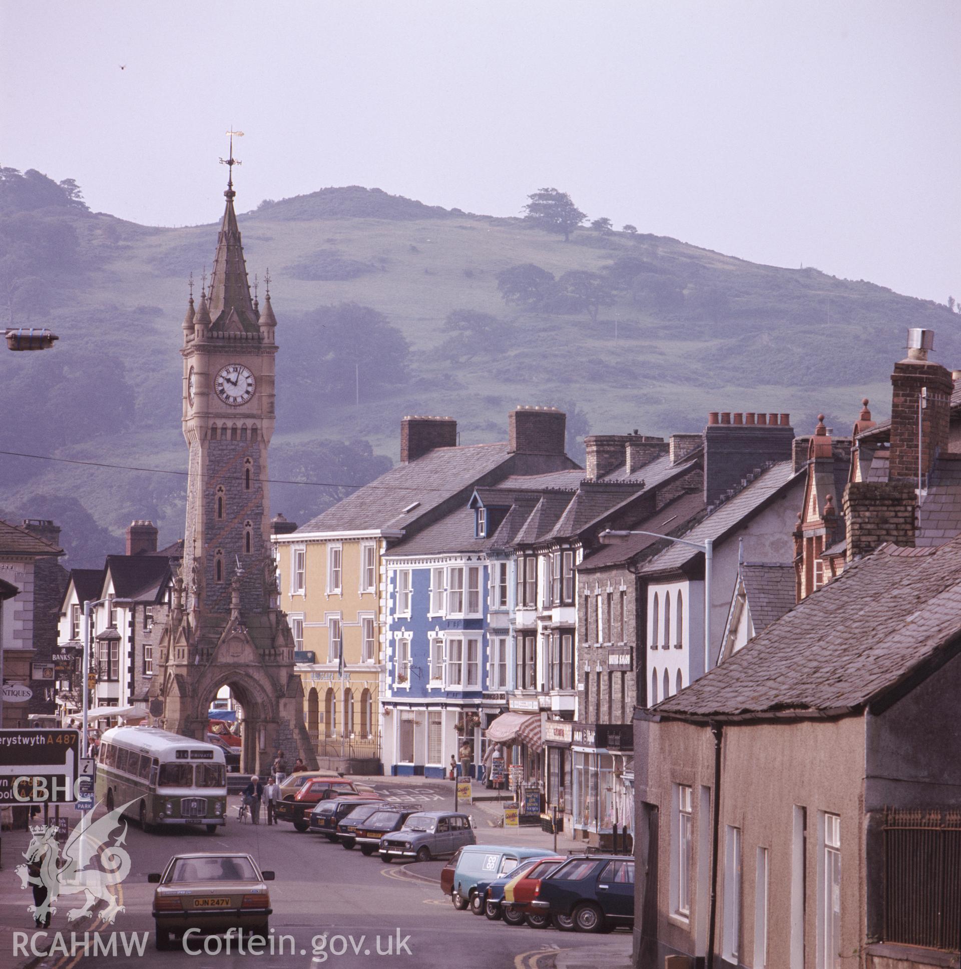 1 colour transparency showing view of Machynlleth town centre; collated by the former Central Office of Information.