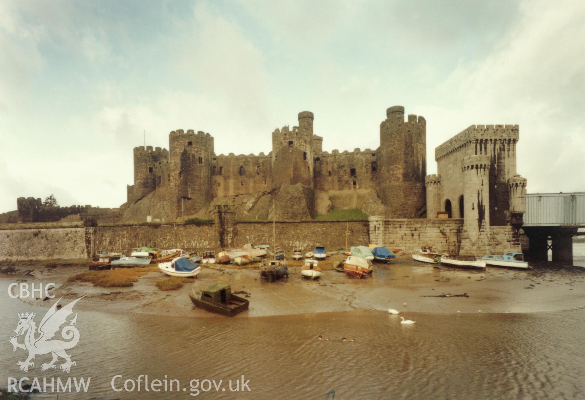 1 of a set of 27 colour prints: print showing view of Conwy castle with boats, collated by the former Central Office of Information.