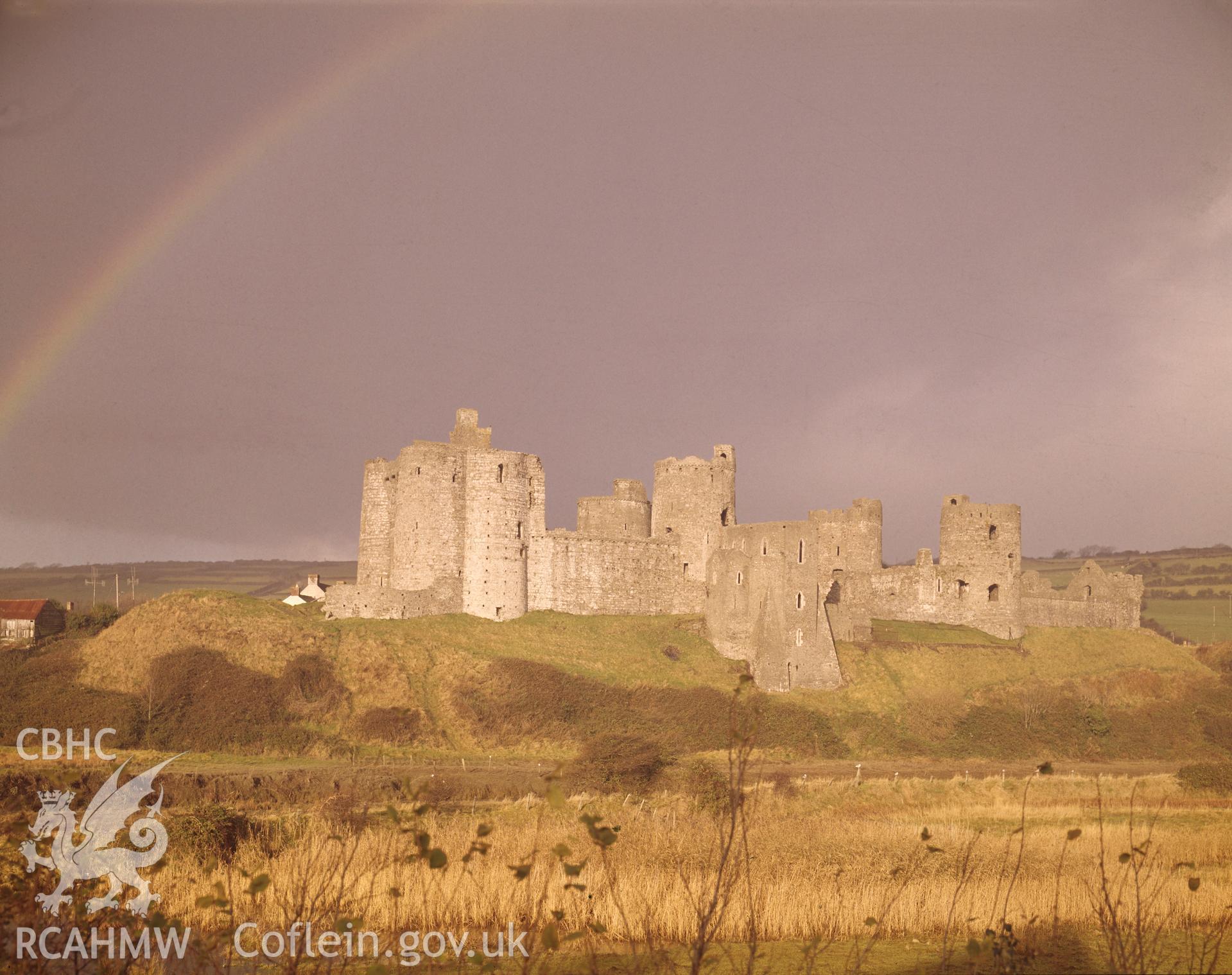 1 colour transparency showing view of Kidwelly castle; collated by the former Central Office of Information.