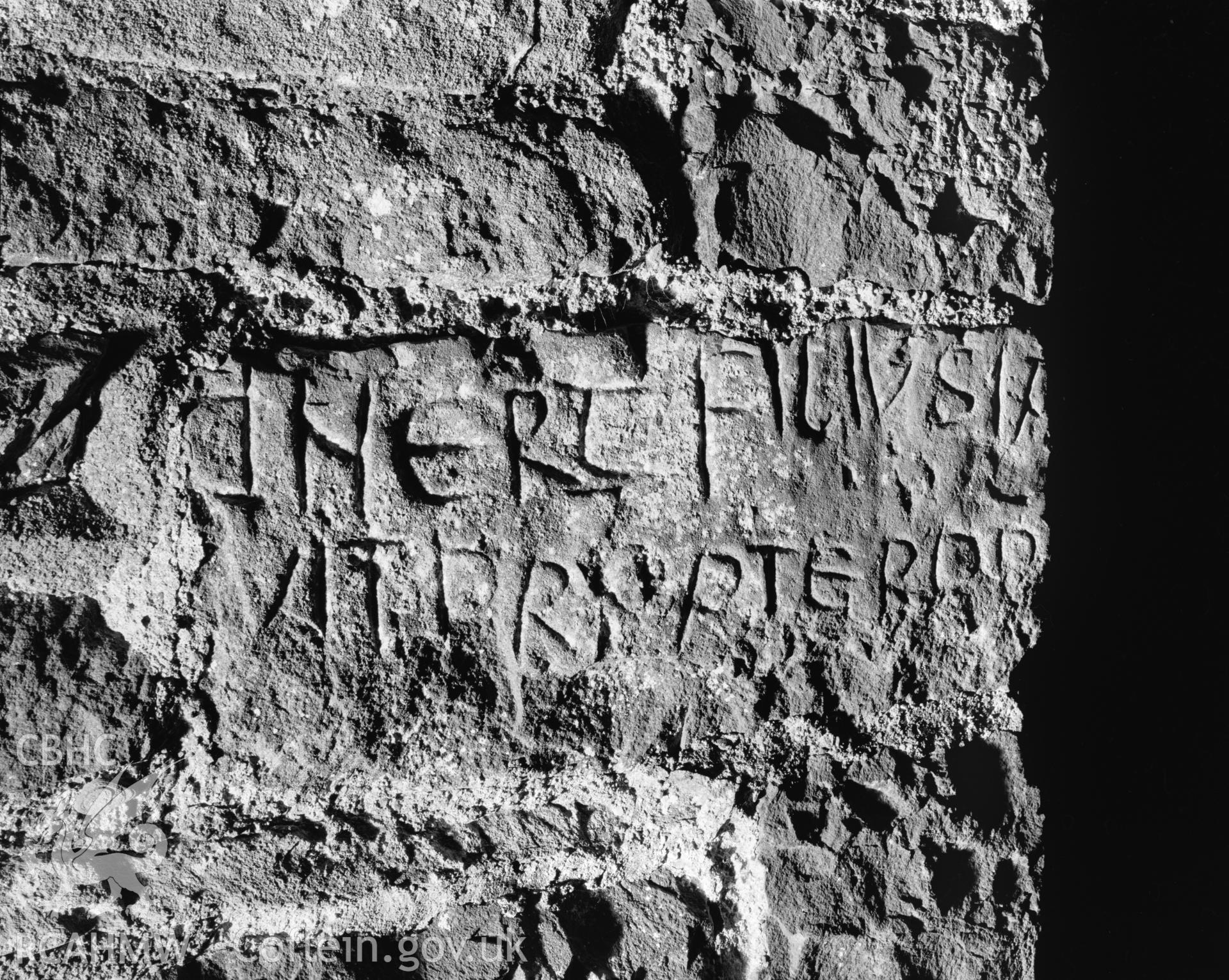 Black and white photograph of fragmentary roman-letter inscribed stone, St. David's Church, Llanddewi Brefi: Corpus of Early Medieval Inscribed Stones and Stone Sculpture in Wales, Volume II: South-West Wales', Figure CD9.3, p.151.