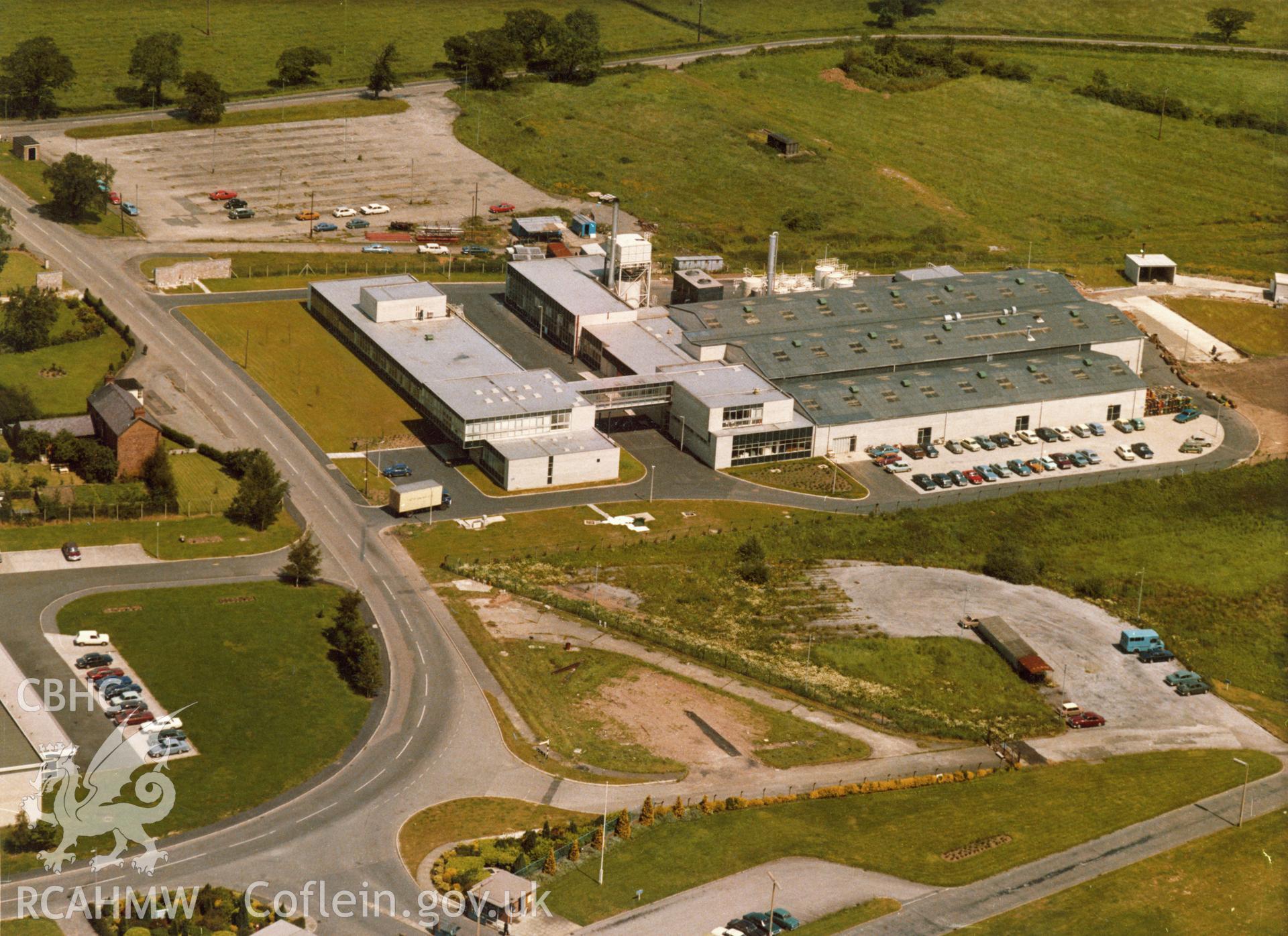 1 b/w print showing aerial oblique view of the Weddell Pharmaceuticals factory at Wrexham; collated by the former Central Office of Information.