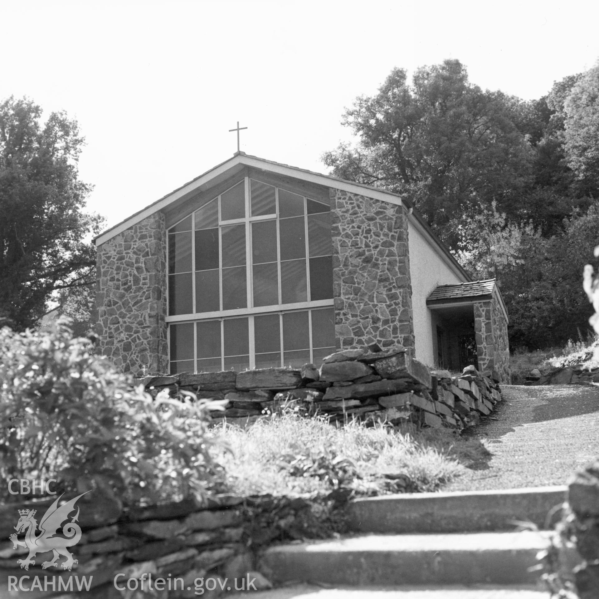 1 b/w print showing view of the new Roman Catholic church, Betws-y-Coed; collated by the former Central Office of Information.