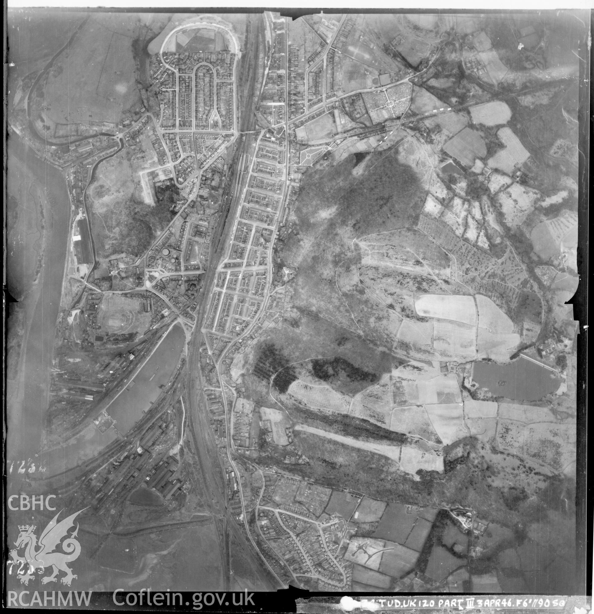 Black and white vertical aerial photograph taken by the RAF on 03/04/1946 centred on SS74589417 at a scale of 1:10000. The photograph includes part of Briton Ferry community in Neath, Port Talbot.