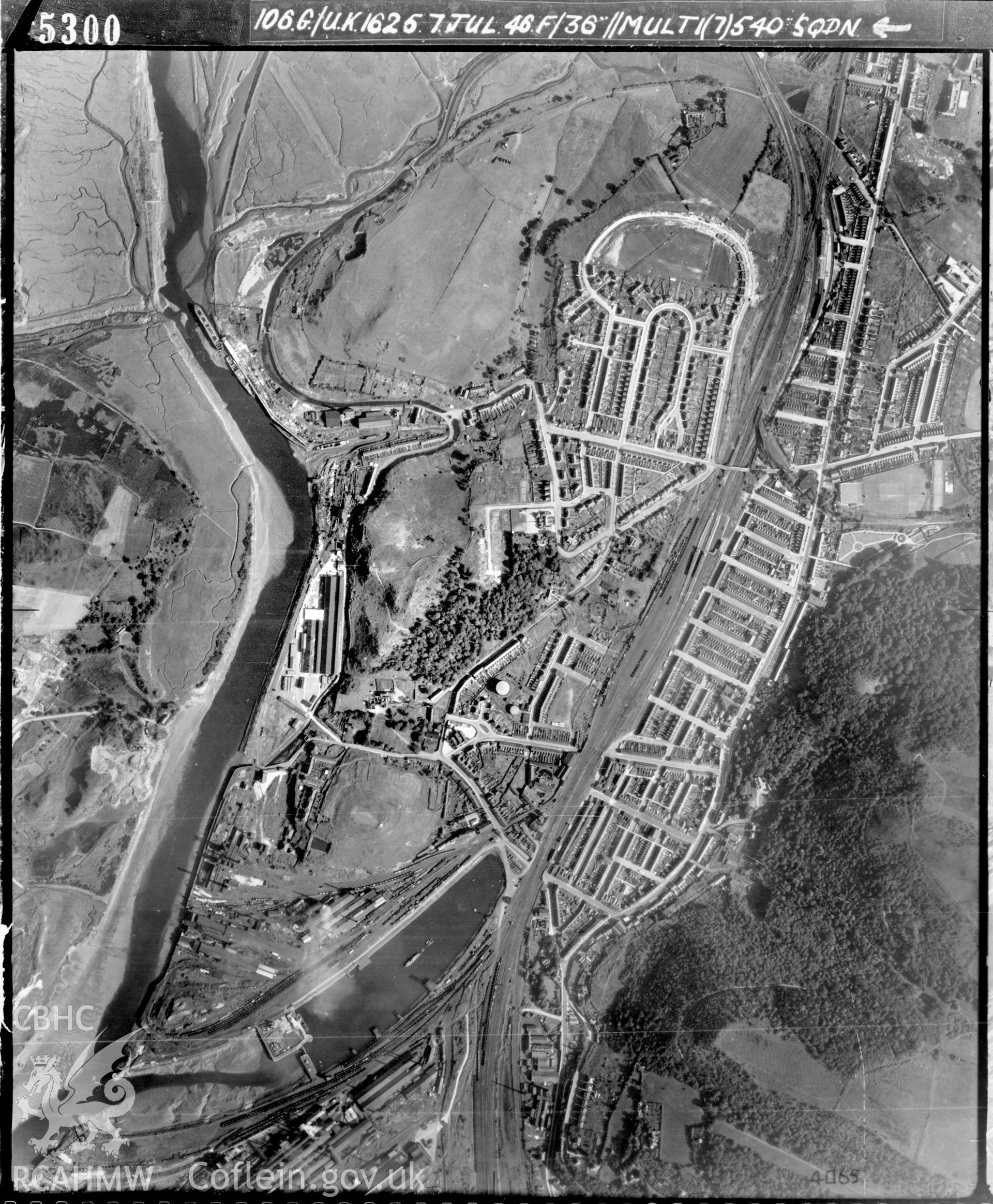 Black and white vertical aerial photograph taken by the RAF on 07/07/1946 centred on SS73809444 at a scale of 1:10000. The photograph includes part of Briton Ferry community in Neath, Port Talbot, and shows Briton Ferry Dock.