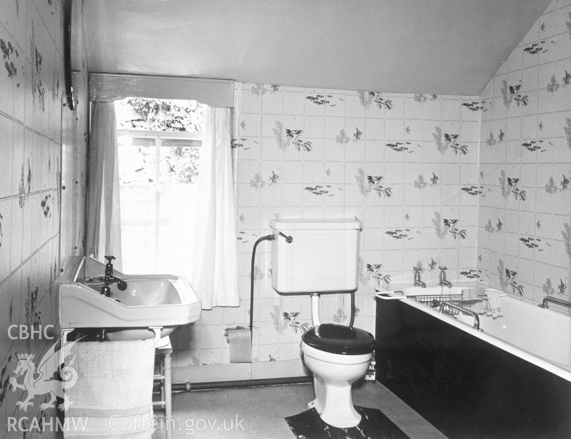 1 b/w print showing interior of cottage on Bod Ychan Terrace, Llanddulas (new bathroom); used as an illustration of the Housing Improvement Grant scheme for exhibitions on Ministry of Housing stands at agricultural shows (1960); collated by the former Central Office of Information.