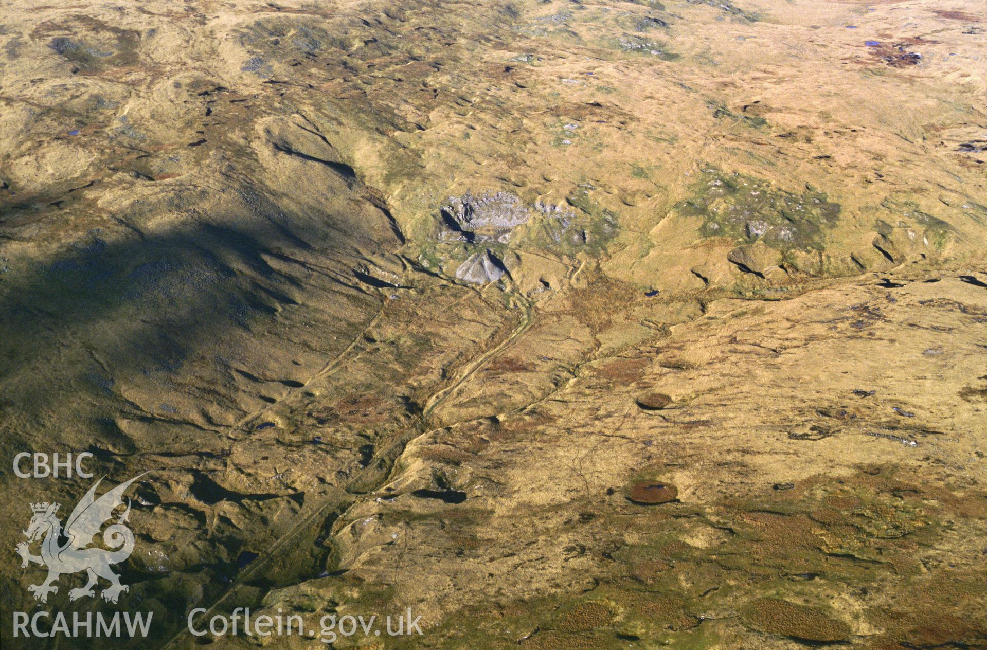 RCAHMW colour slide oblique aerial photograph of Foel Fraith Limeworking Complex, Quarter Bach, taken by CR Musson on 24/11/88