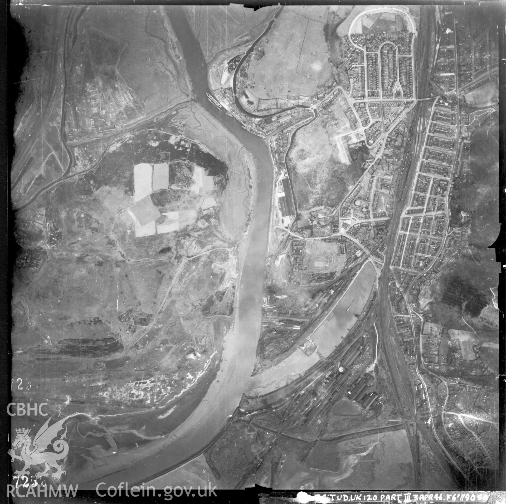 Black and white vertical aerial photograph taken by the RAF on 03/04/1946 centred on SS73459415 at a scale of 1:10000. The photograph includes part of Briton Ferry community in Neath, Port Talbot.