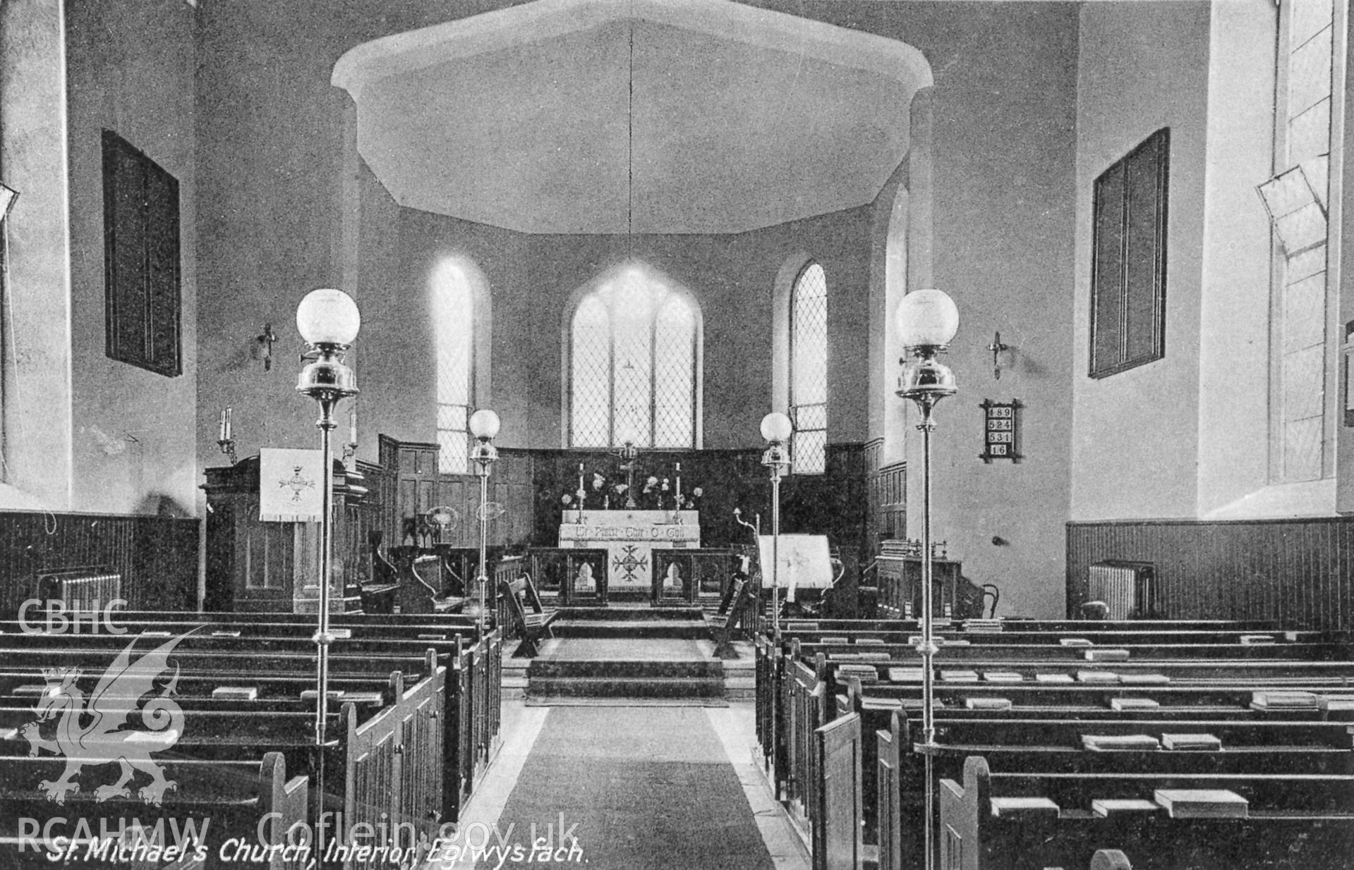 Black and white original postcard of the interior of St Michael's Church, Eglwysfach.