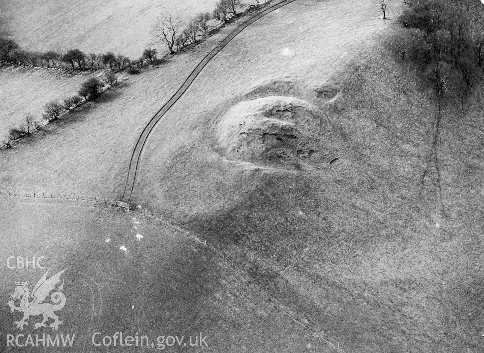 RCAHMW black and white aerial photograph of Moel Frochas Motte and Bailey. Taken by C R Musson on 30/01/1995